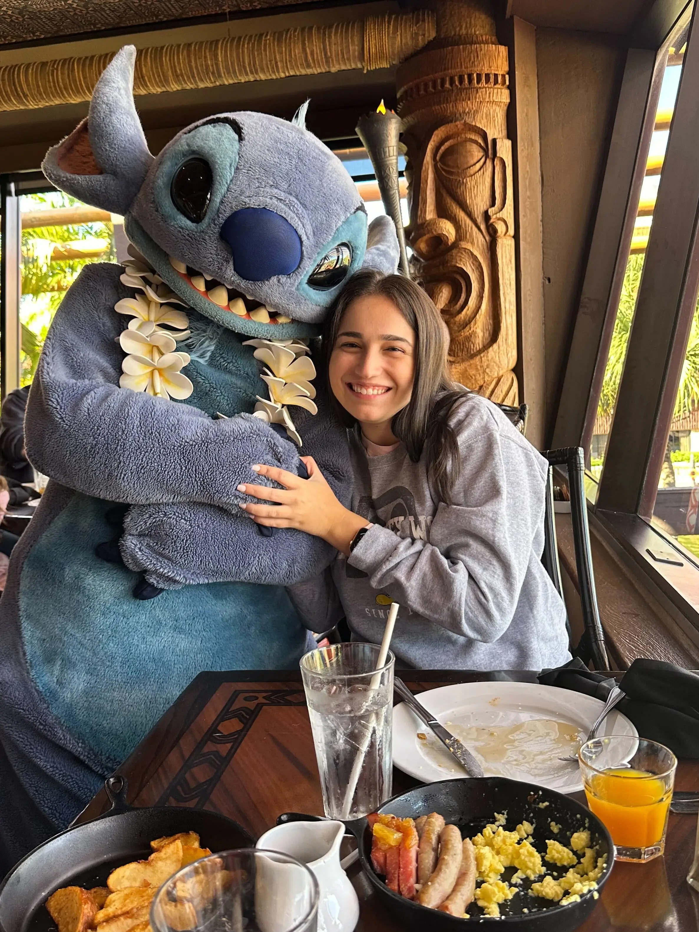 Here I am with Stitch at Ohana at Disney's Polynesian Resort.