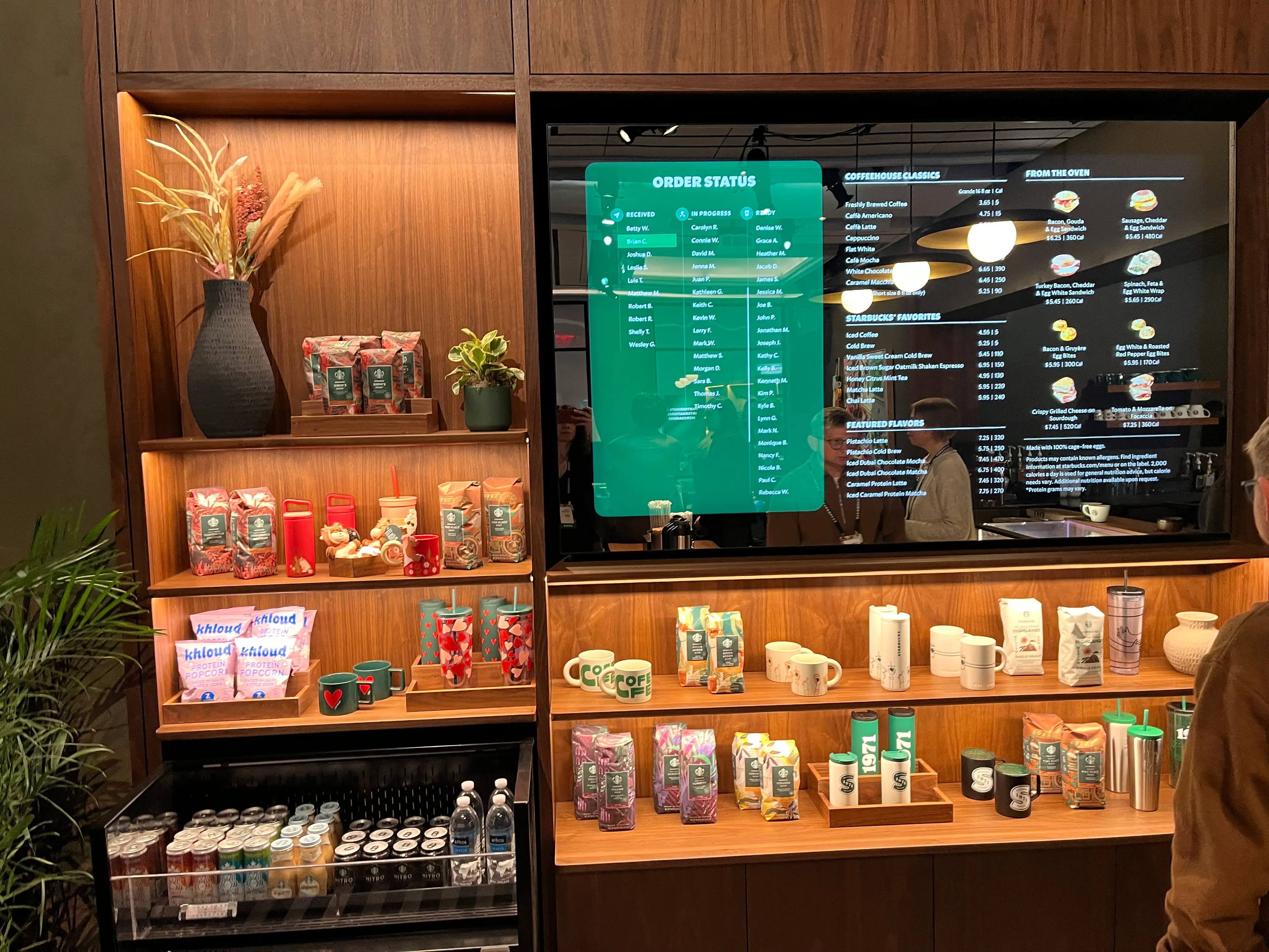 Starbucks digital menus can display menu items and order statuses.