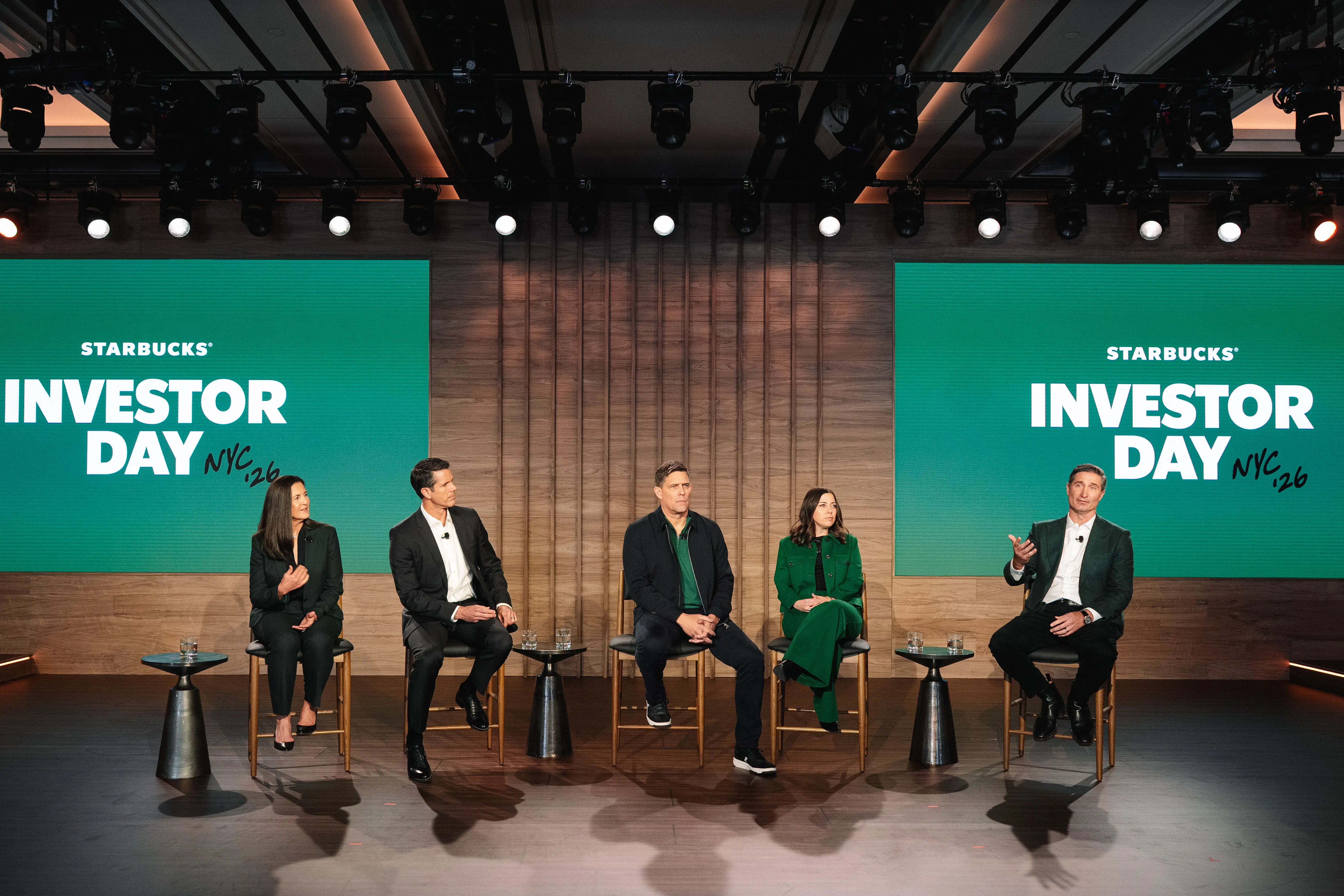Starbucks execs speak on stage during Investor Day.