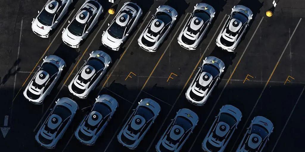 Behind robotaxis are thousands of humans helping the AI drive better