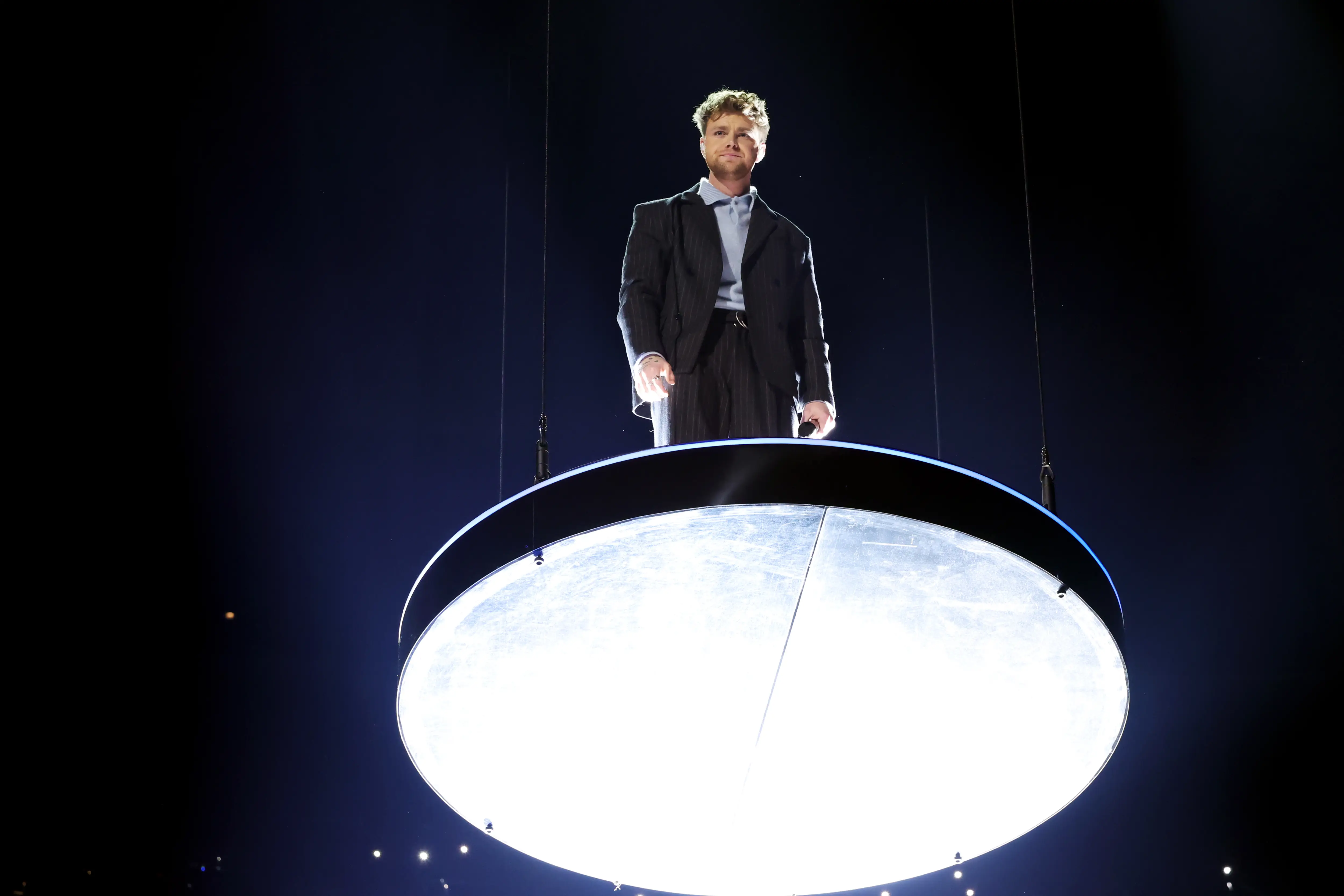 Alex Warren performs at the 2026 Grammys.