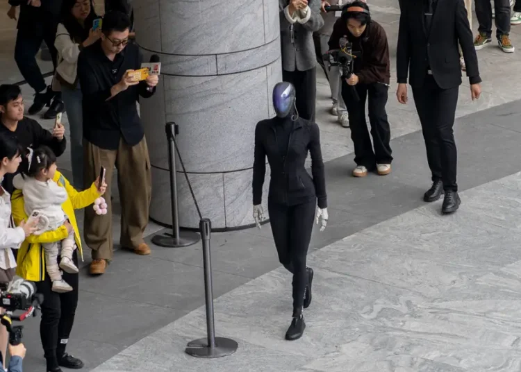 A Chinese humanoid robot flopped face-first onto the ground during a public showcase. Its CEO says it’s all part of ‘learning to walk.’