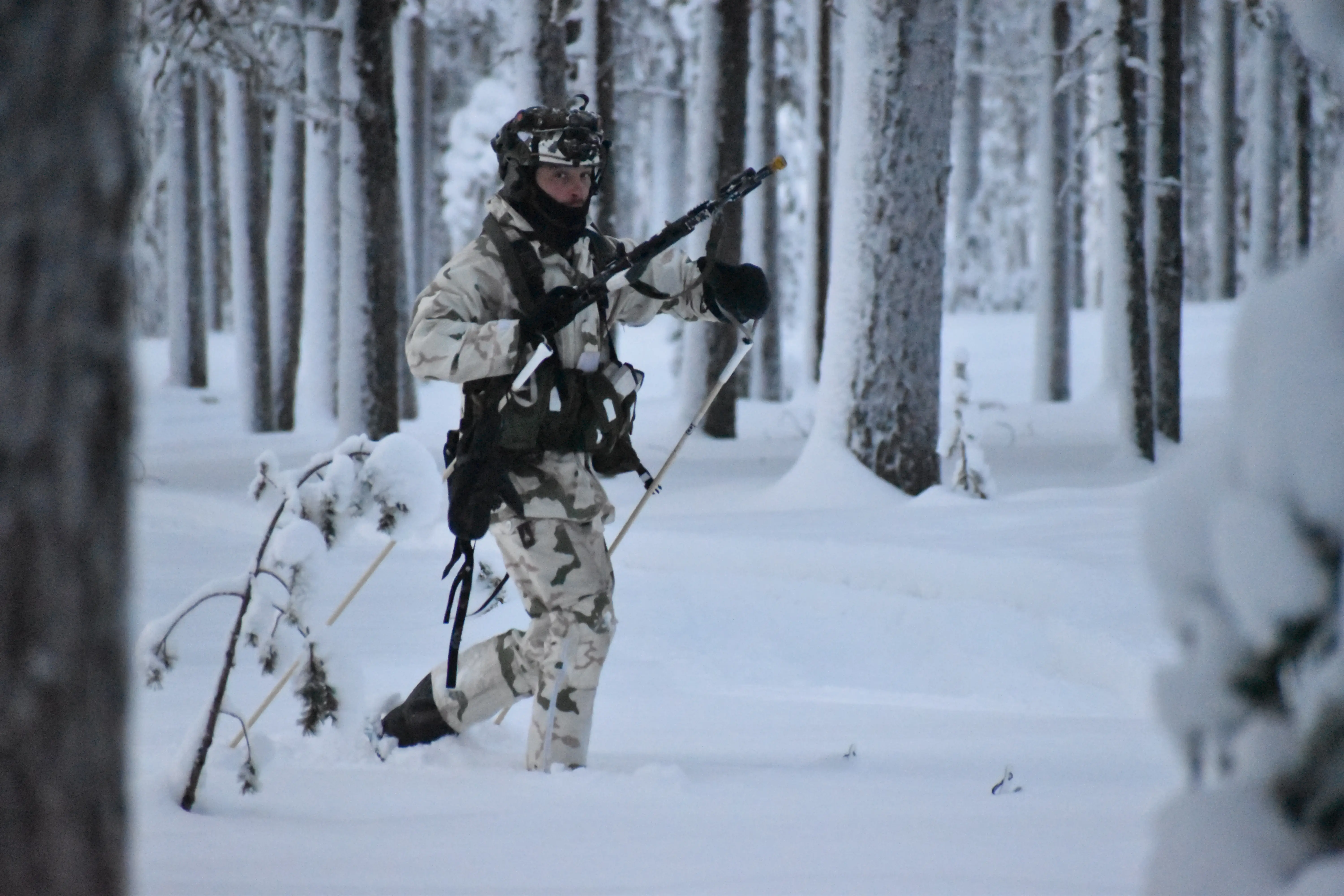 A NATO soldier moves during a training course in northern Finland in January 2026.