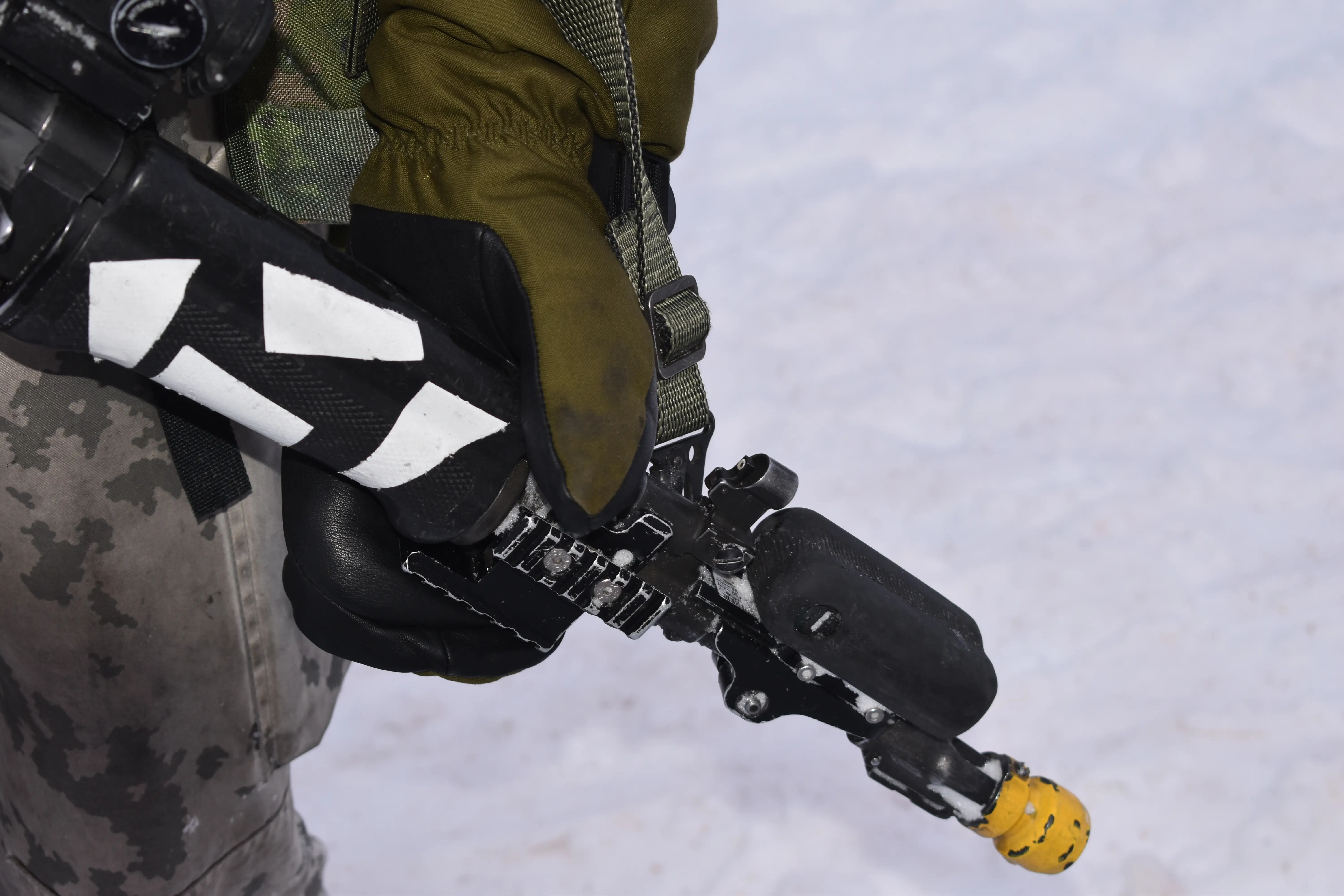A NATO soldier holds their gun during a training course in northern Finland in January 2026.