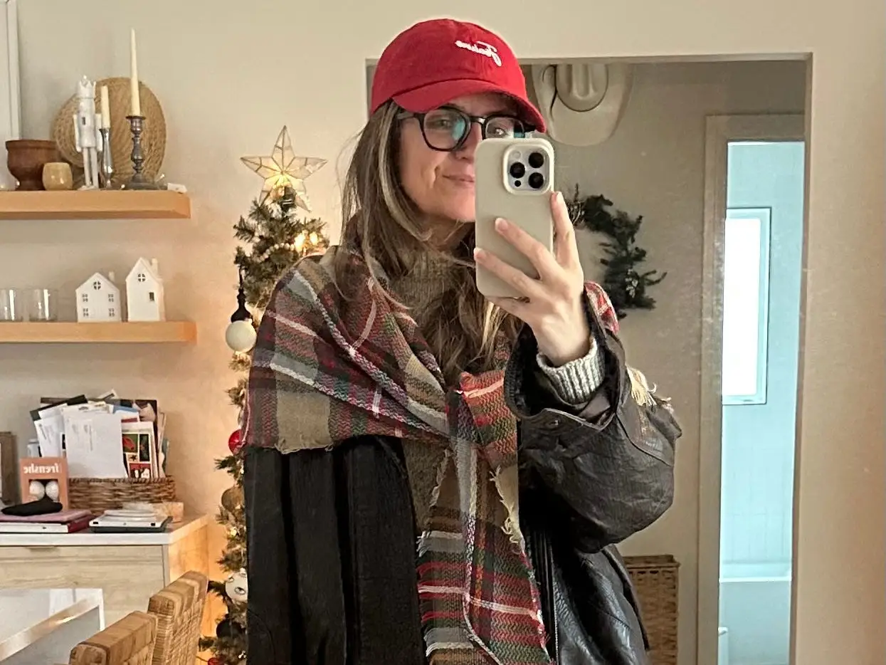 Woman posing for photo on mirror