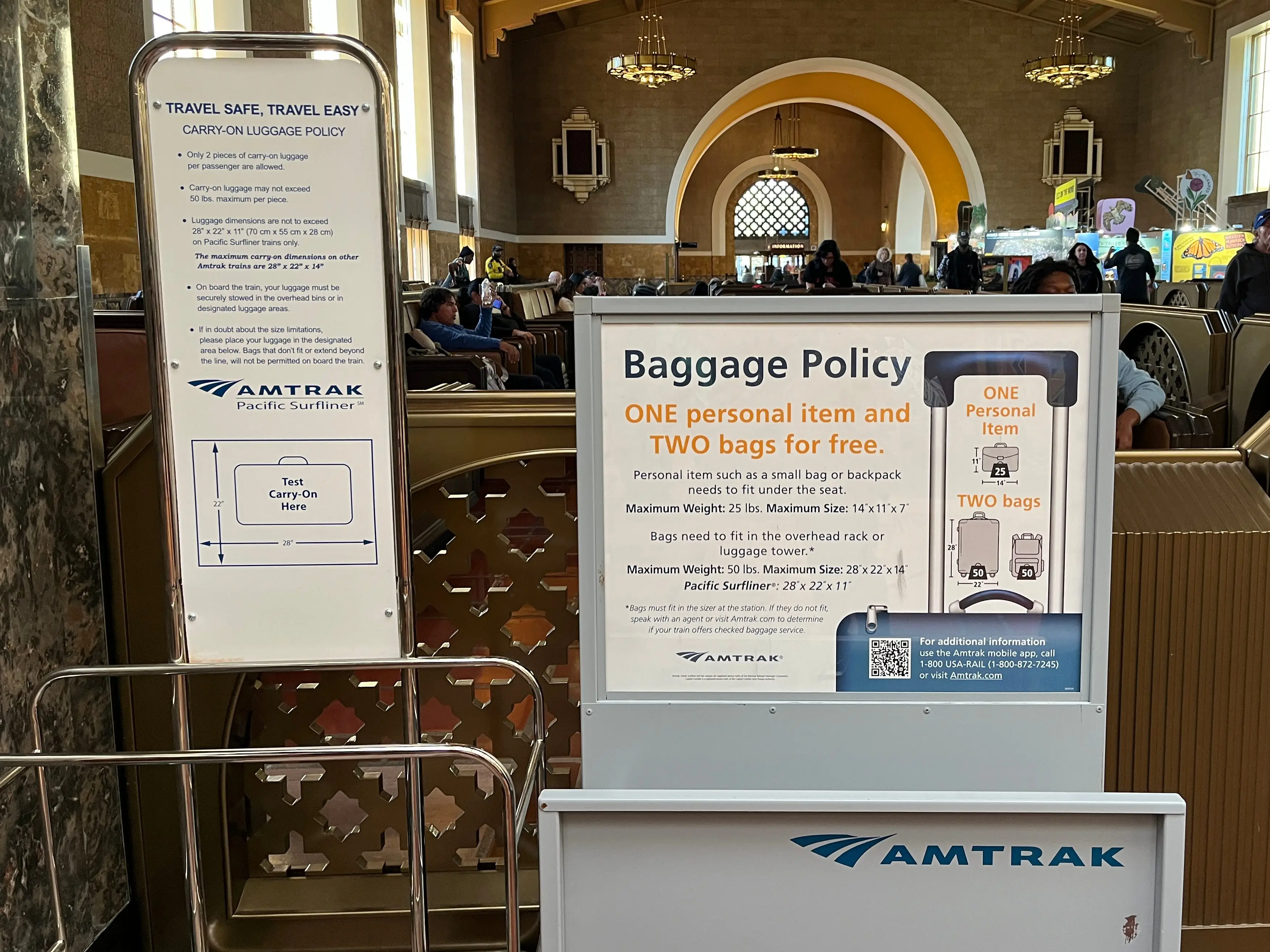 A sign explaining Amtrak's baggage policy in a train station.