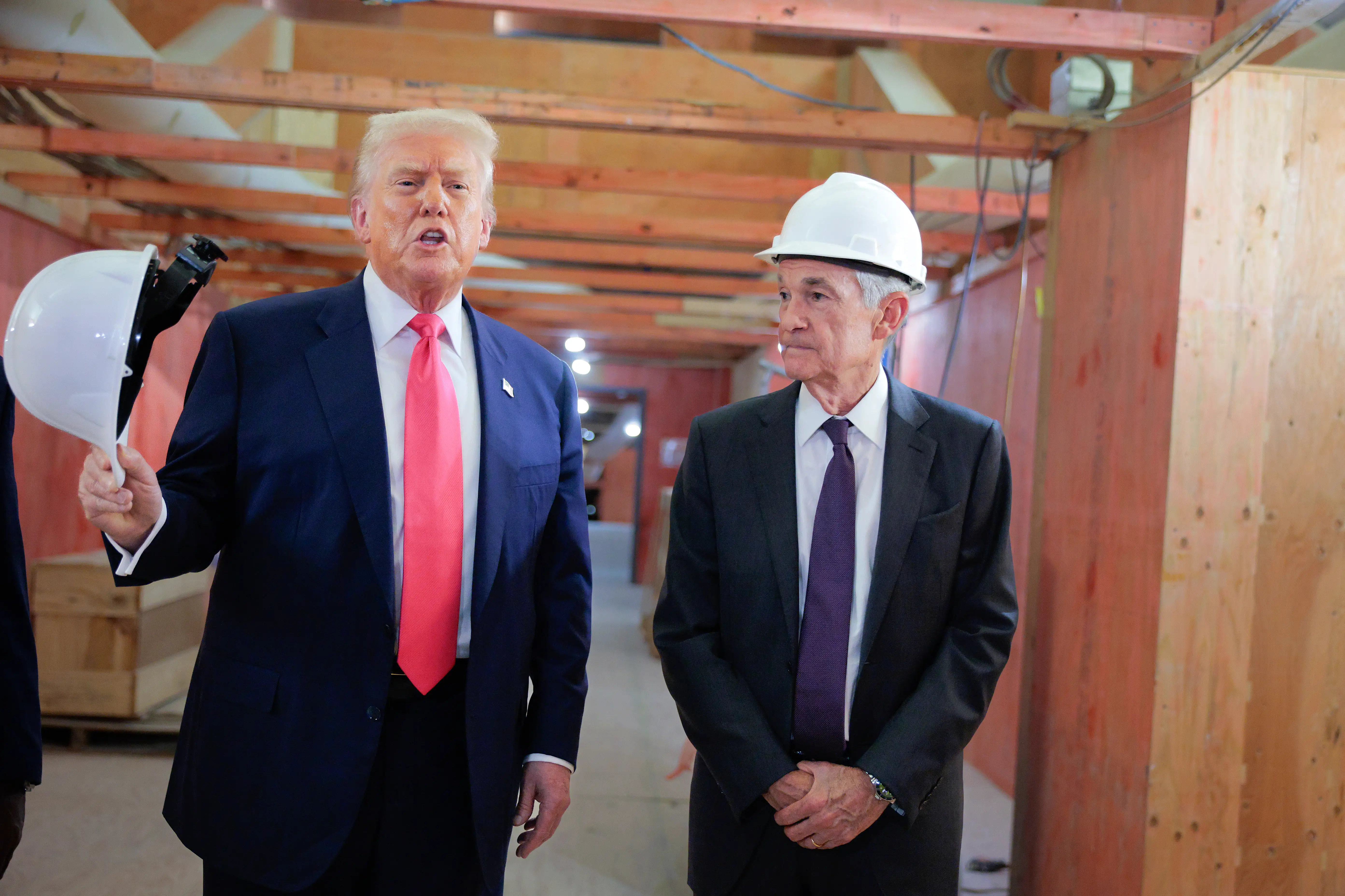 President Donald Trump delivers remarks alongside Federal Reserve Chair Jerome Powell, as they tour the Federal Reserve's $2.5 billion headquarters renovation project on July 24, 2025 in Washington, DC.
