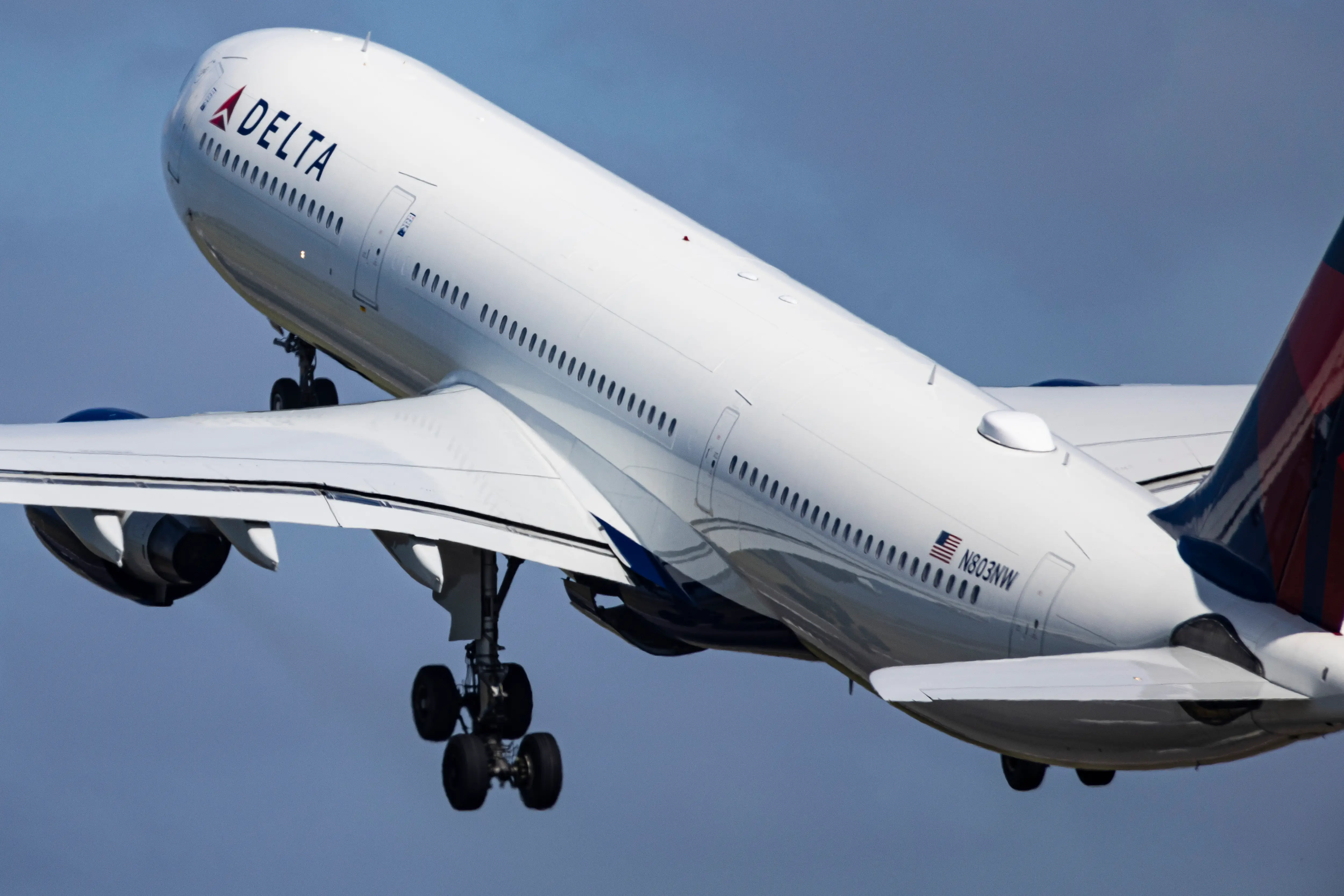 Delta Air Lines Airbus A330-300 wide body passenger airplane spotted taking off from Polderbaan runway departing from Amsterdam Schiphol AMS Airport to Minneapolis USA MSP airport as flight DL163