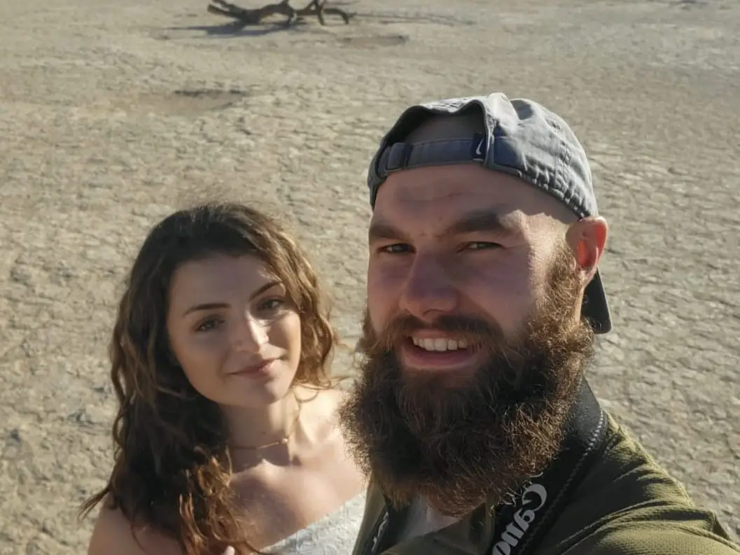 Man and woman in desert area on hike