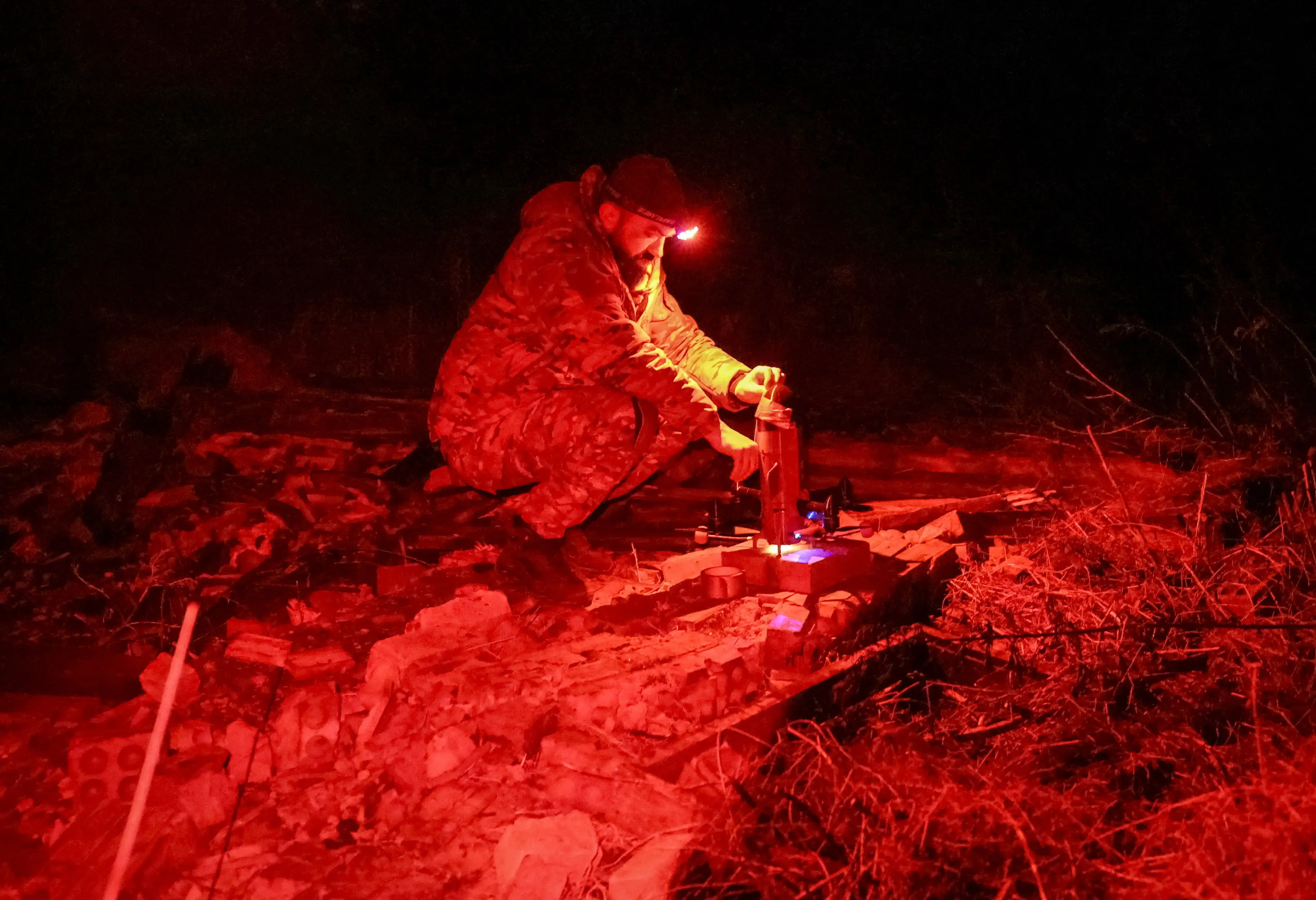 A serviceman from the SQUADRON interceptor unit of the 3rd Army Corps of the Ukrainian Armed Forces prepares a Ukrainian drone-interceptor Sting for a flight at their front line position, amid Russia's attack on Ukraine, near the frontline in eastern Ukraine, October 31, 2025.
