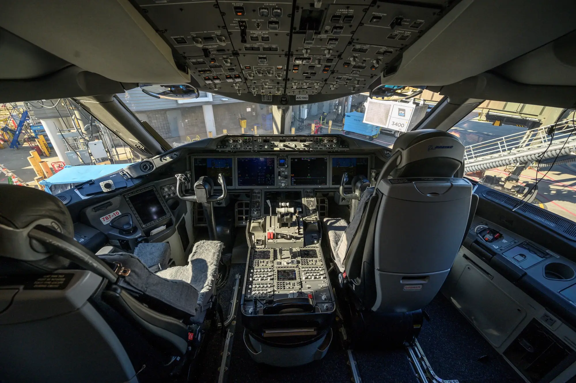 Commercial airlines feature seats in the flight deck behind the captain and first officer, known as jump seats. They are reserved for certified industry professionals like off-duty pilots.