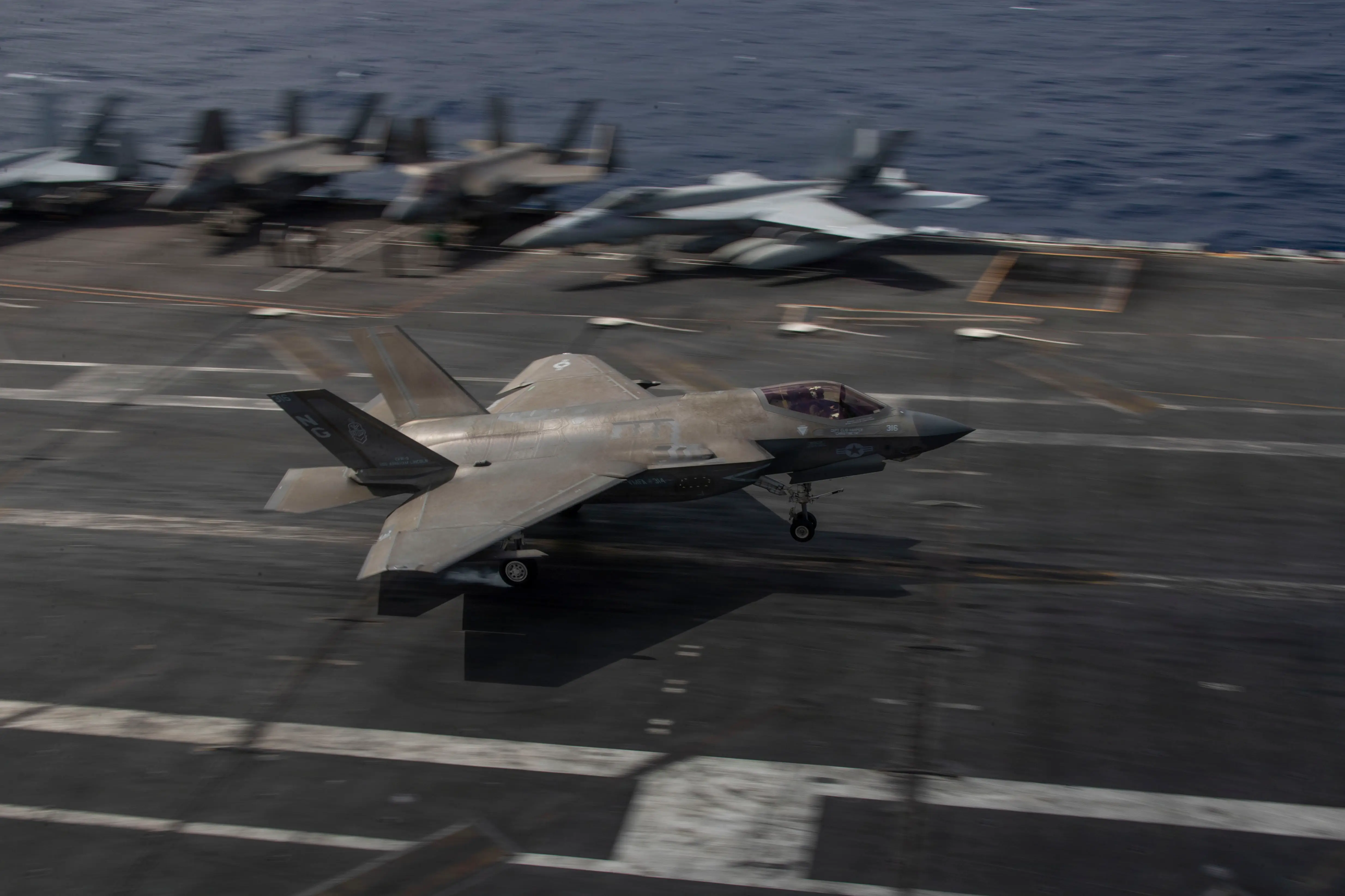 An F-35C Lightning II, attached to Marine Fighter Attack Squadron (VMFA) 314, makes an arrested landing on the flight deck of Nimitz-class aircraft carrier USS Abraham Lincoln (CVN 72) on January 15, 2026.