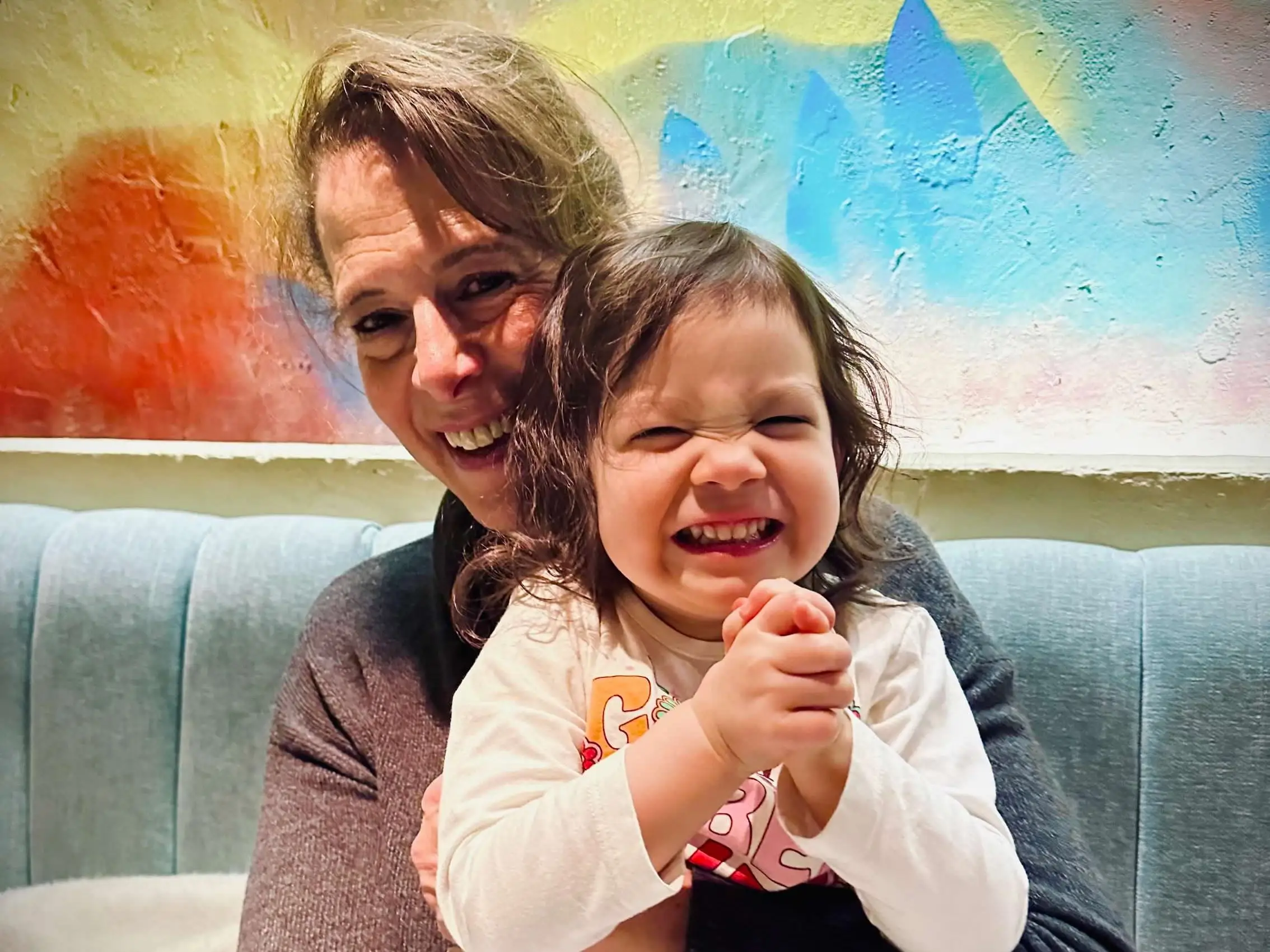 Woman holding toddler