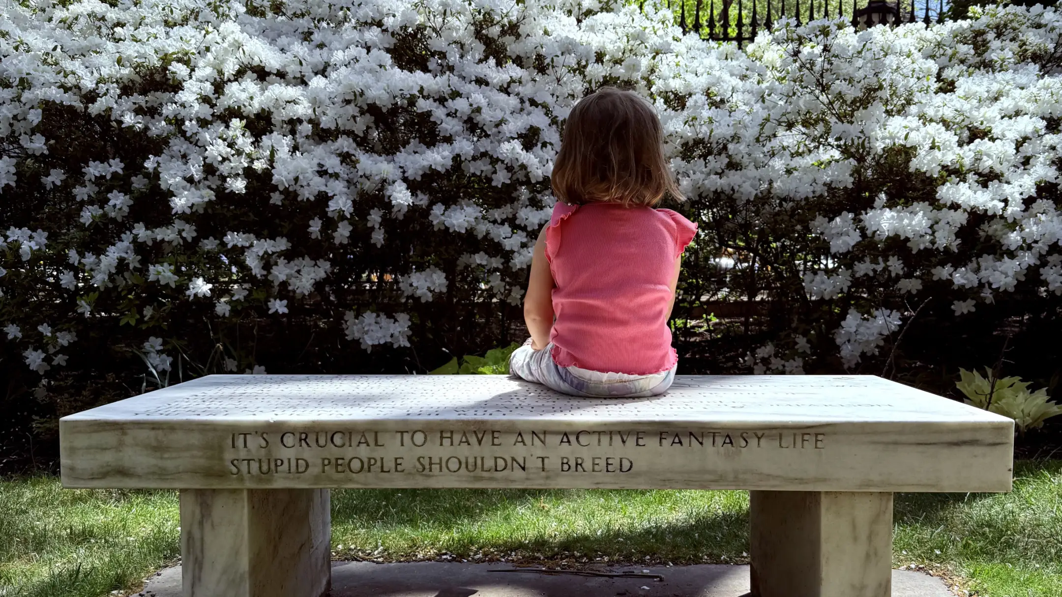 Toddler sitting on bench