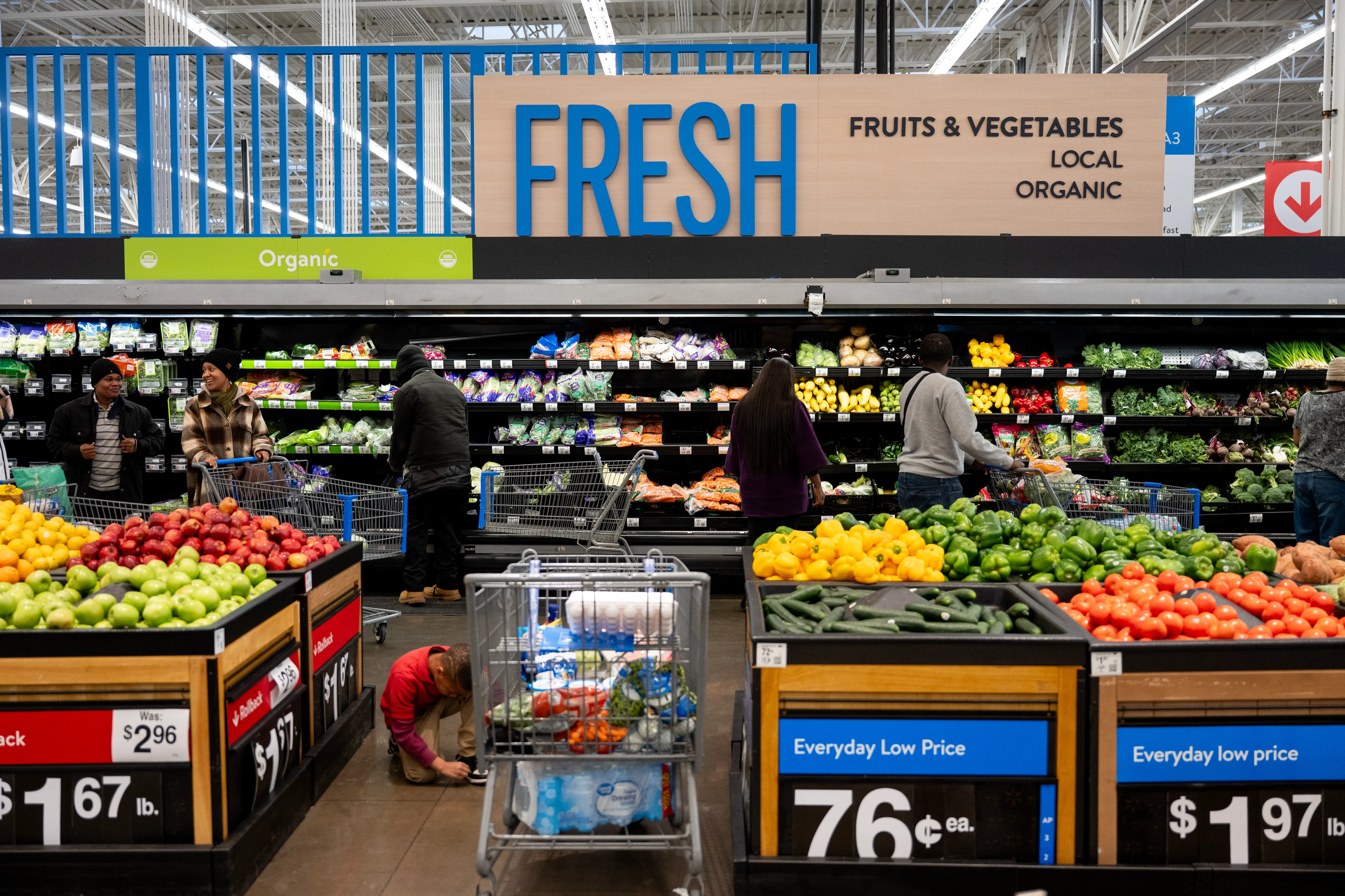 Customers shop at Walmart on January 22, 2026 in Little Rock, Arkansas.