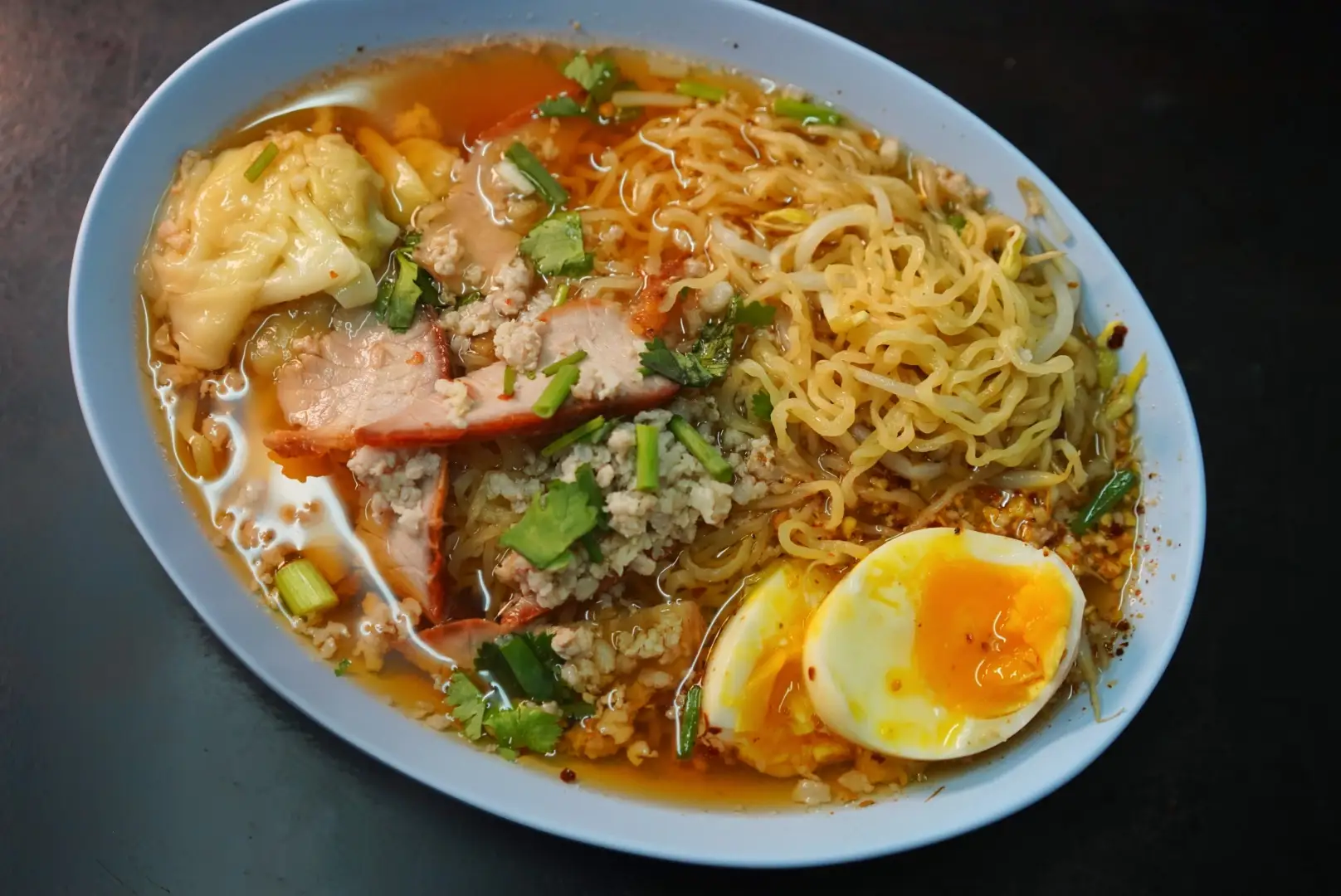 Lung Cheay's' signature egg noodles in Bangkok.