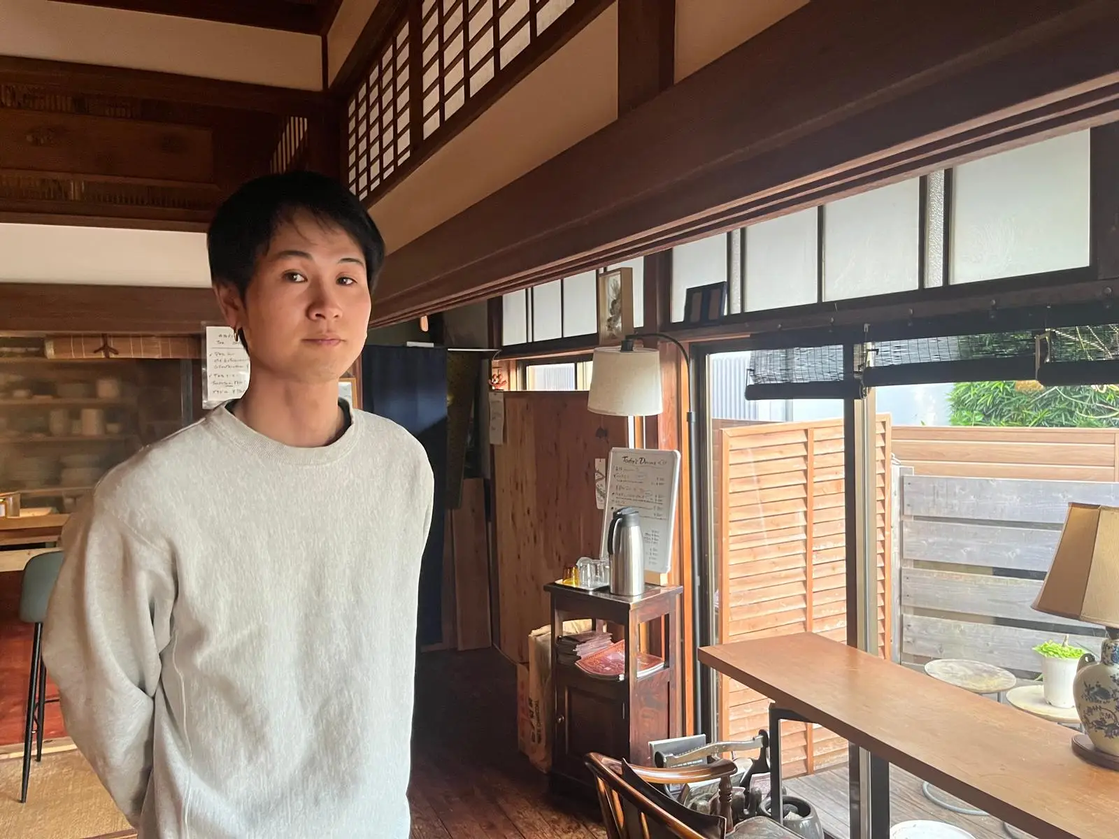 Aoi Onodera  in his café in Japan.