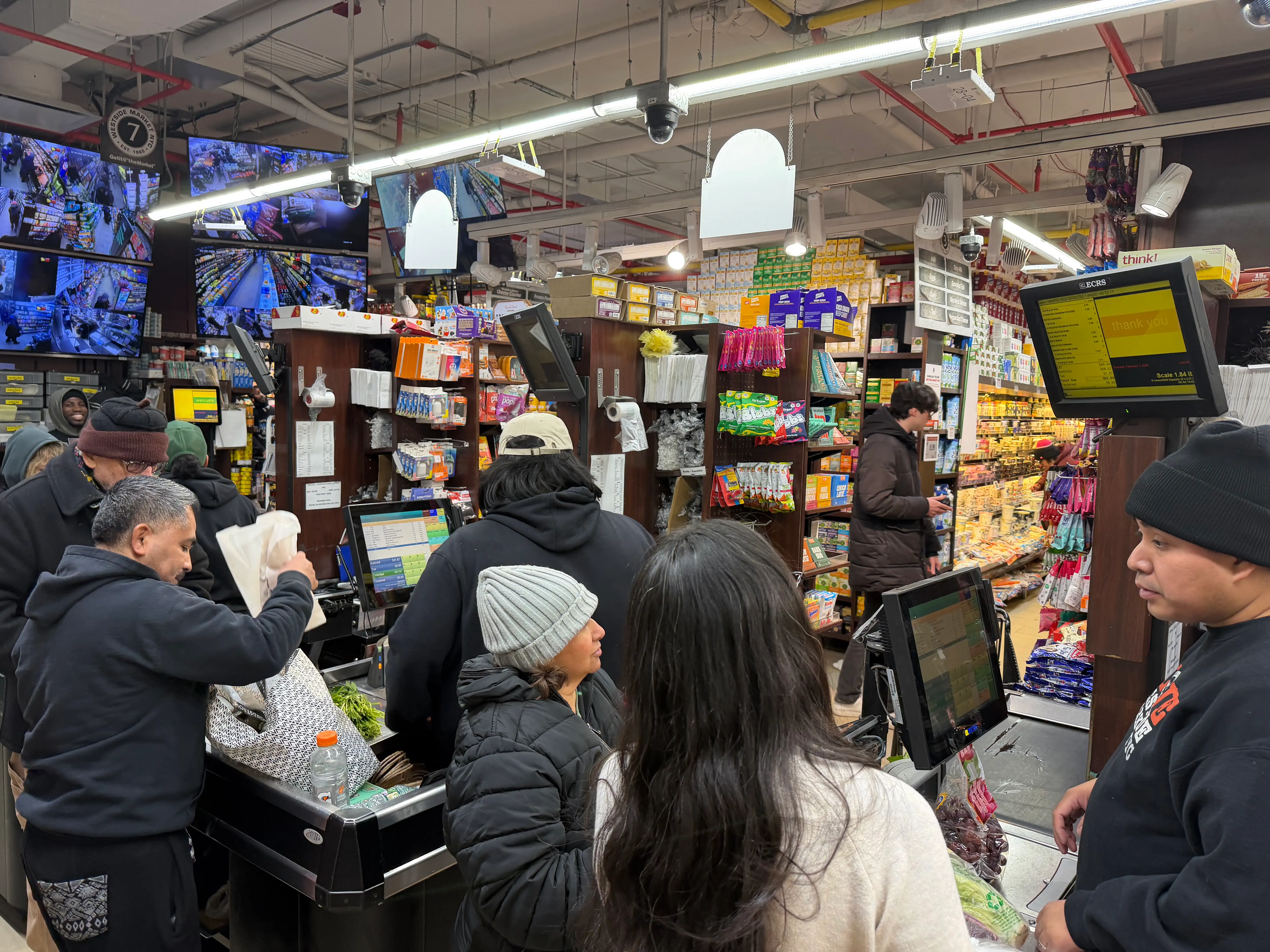 The checkout counter at Kalshi's free grocery pop-up is pictured.
