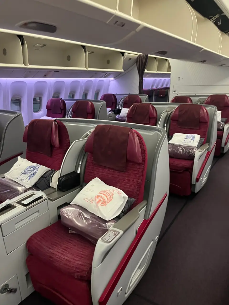 Qatar business class view with pairs of two seats