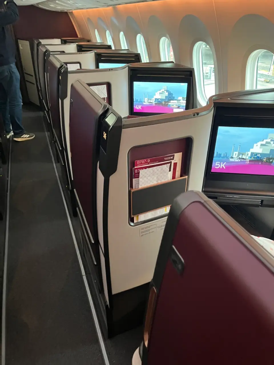 View of pod-like seats in Qatar business class