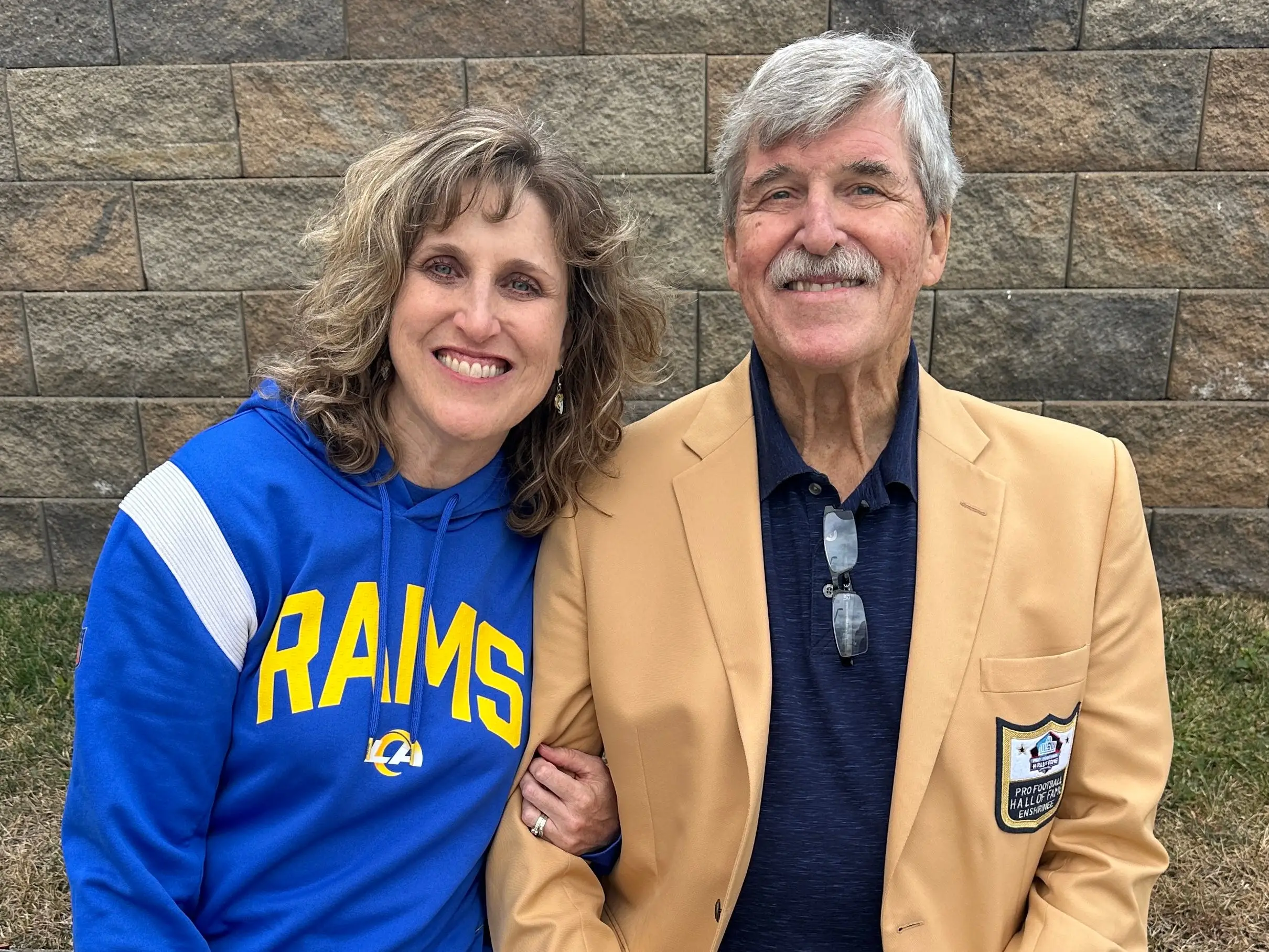 Daughter and dad posing for photo