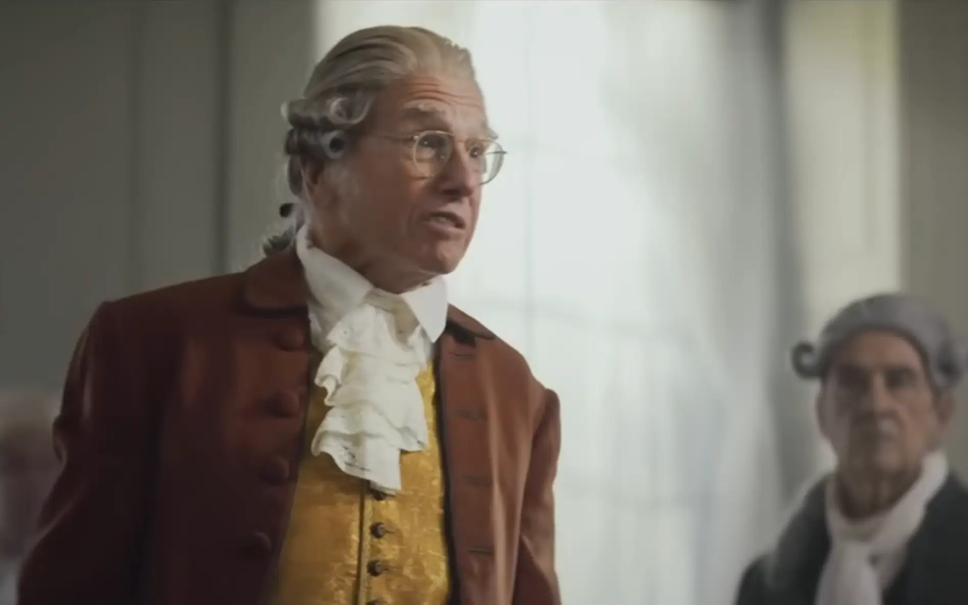 Larry David, dressed as a US Founding Father, scolds his fellow framers.