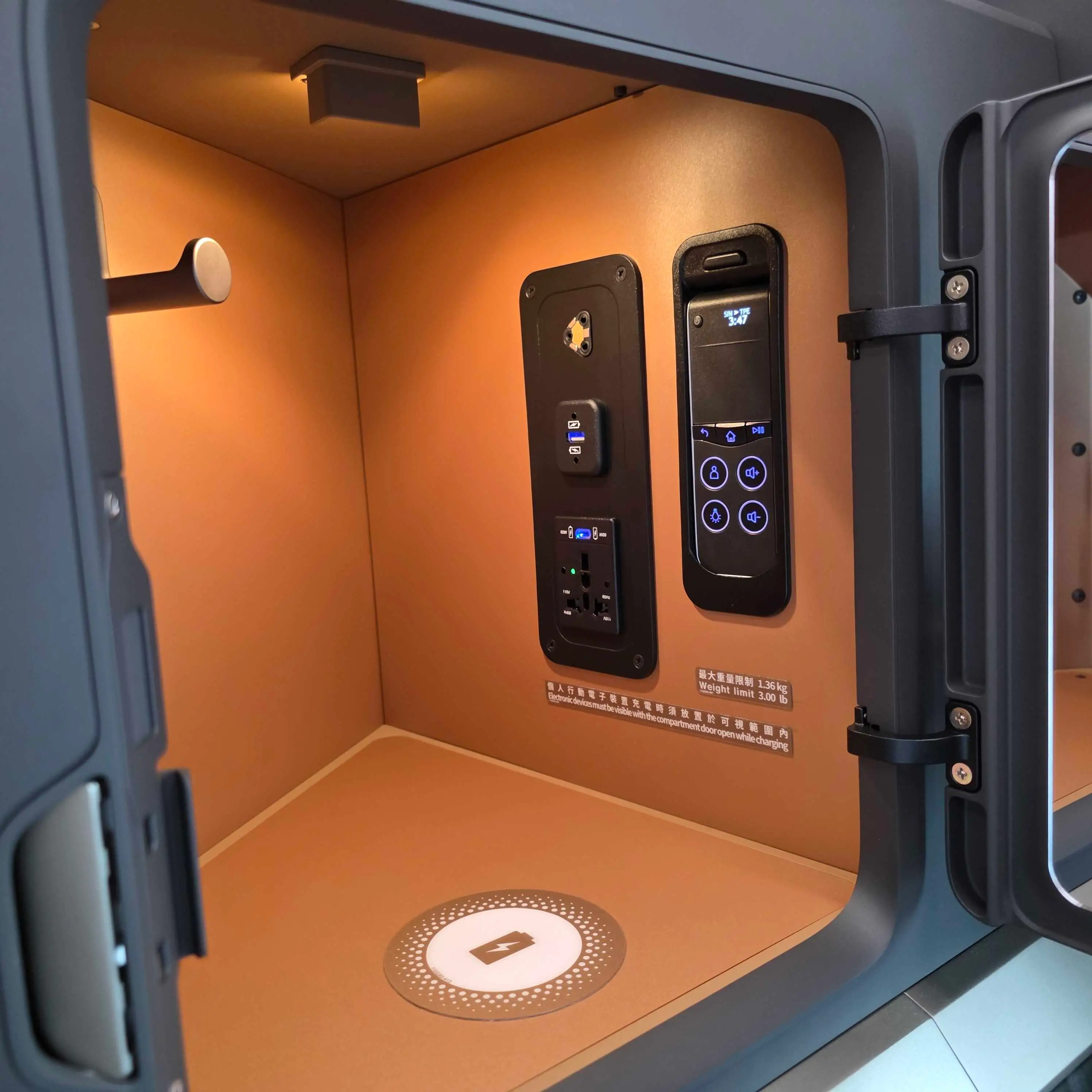 Starlux Business Class cubby, empty.