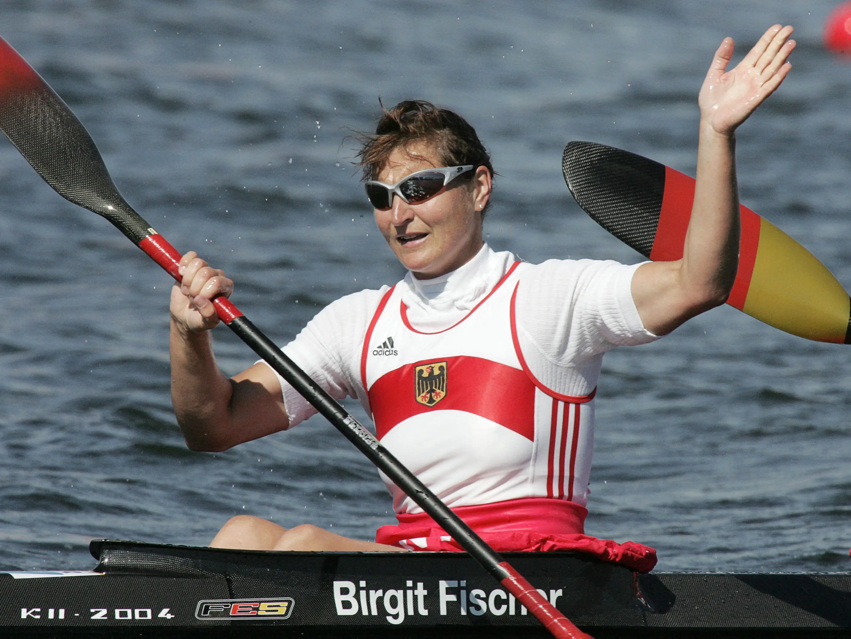 Birgit Fischer gestures after finishing second with teammate Carolin Leonhardt (not pictured) in the Women's K2 500m final for the Athens 2004 Olympic Games at the Schinias Rowing and Canoeing Center, outside Athens, 28 August 2004.