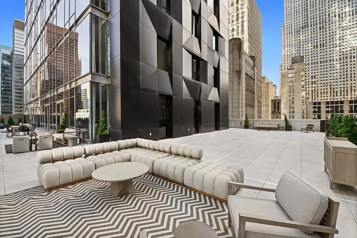 Seating on the outdoor deck of a condo rented by Floyd Mayweather