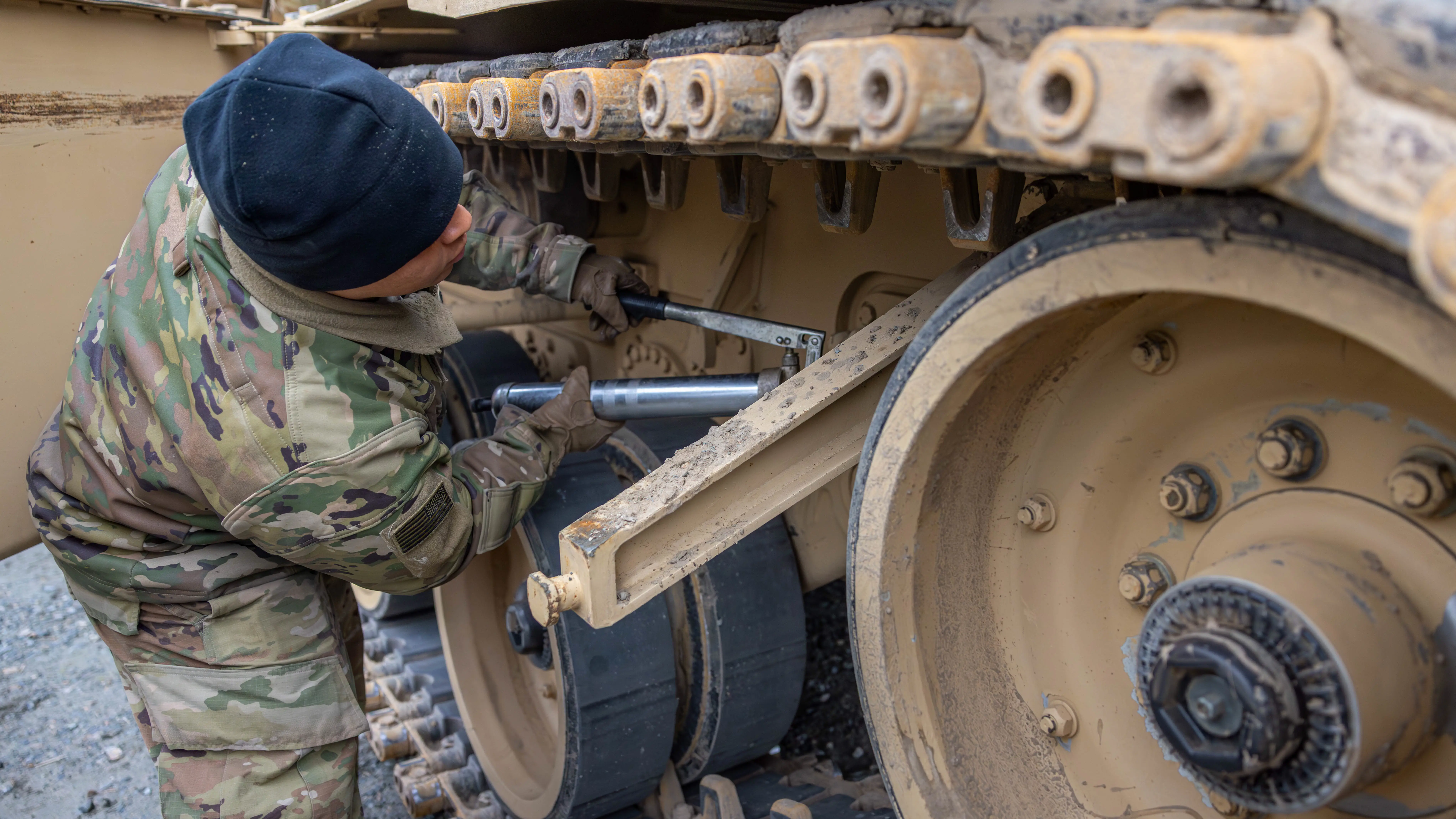 A US soldier repairs an M1 Abrams tank in Latvia, on Nov. 17, 2025.