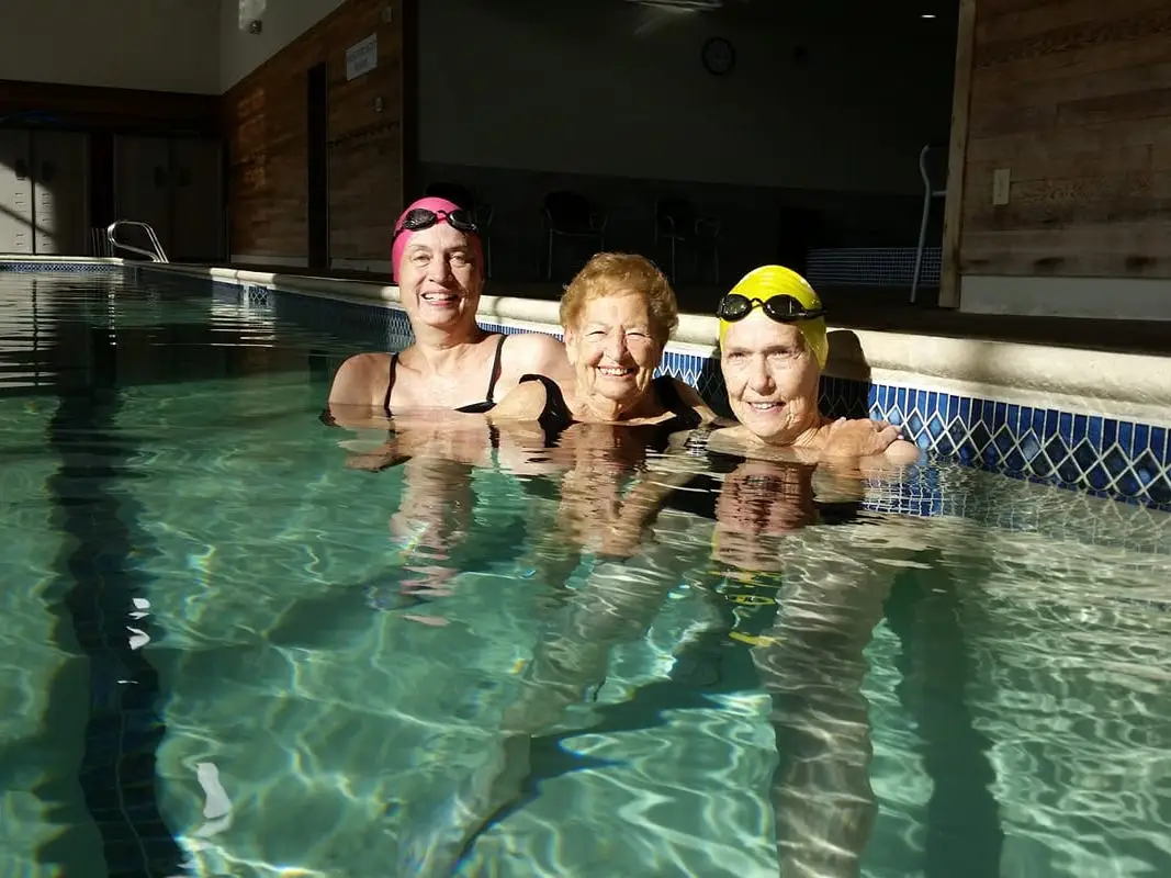Cynthia Wall and her friends in the pool at her gym