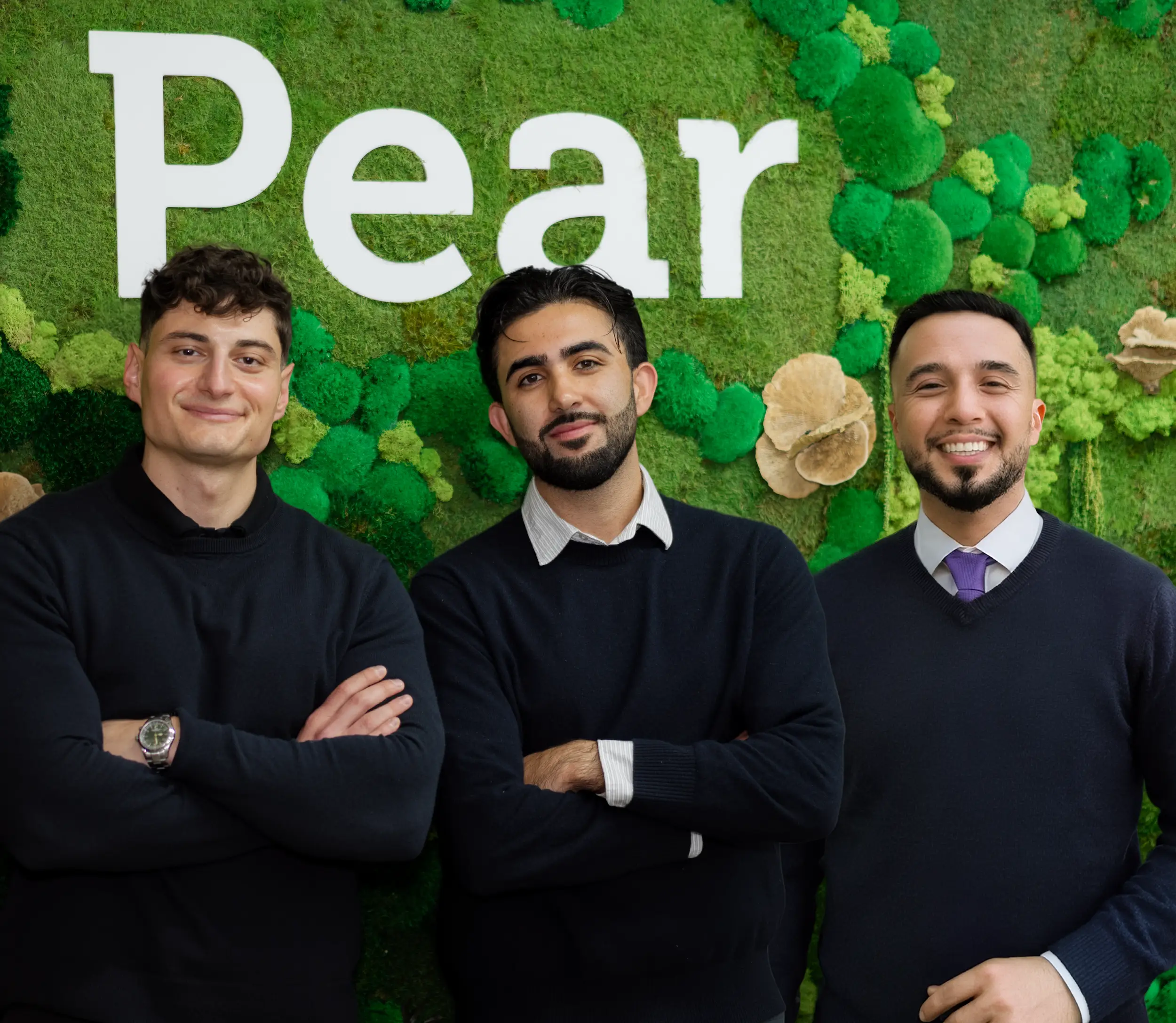 A group photo of Guard Owl's cofounders