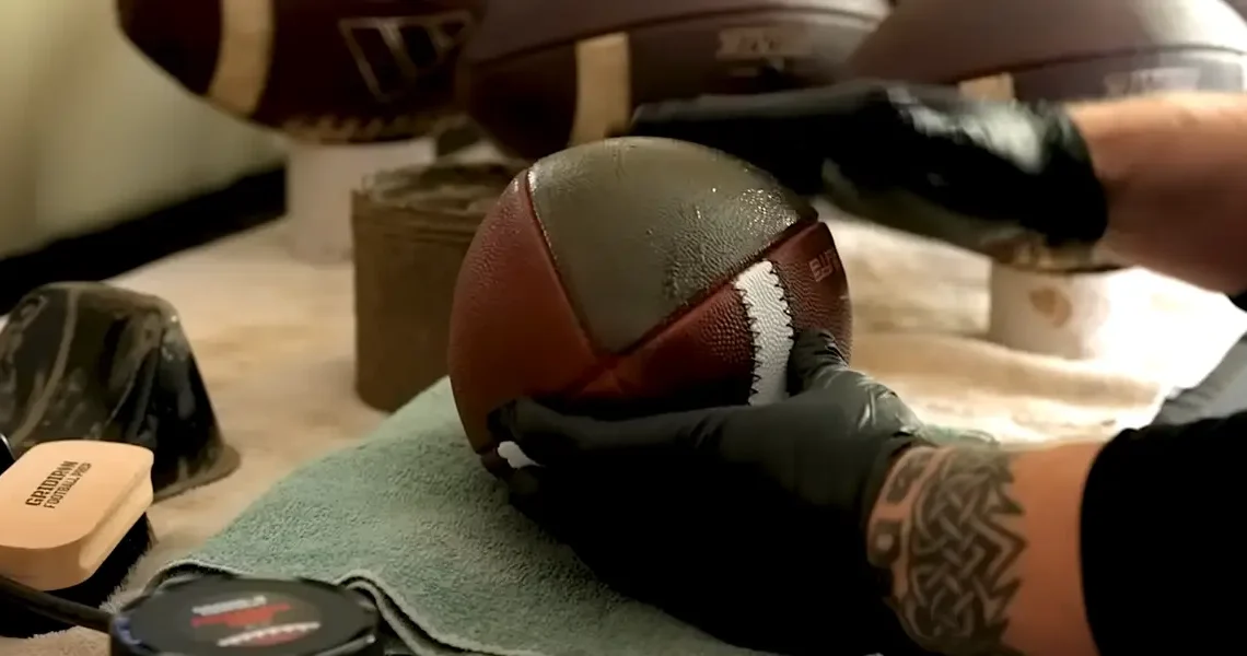 I got let go from my job. Now, NFL and college teams pay me for my muddy footballs.