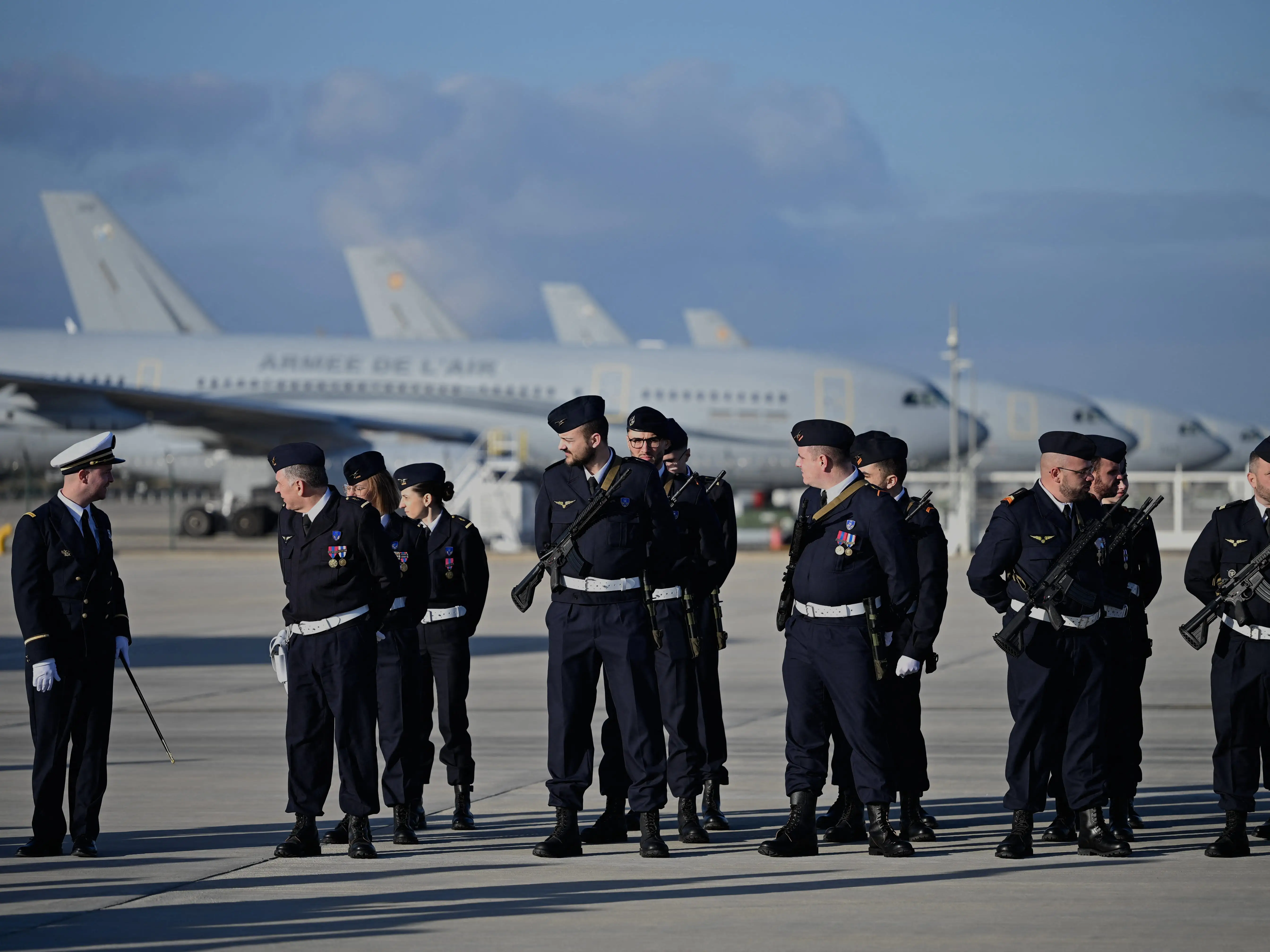 French soldiers wait for the arrival of French President at the Istres military air force base where he is scheduled to deliver his New Year's address to the armed forces in Istres, southern France, on January 15, 2026.