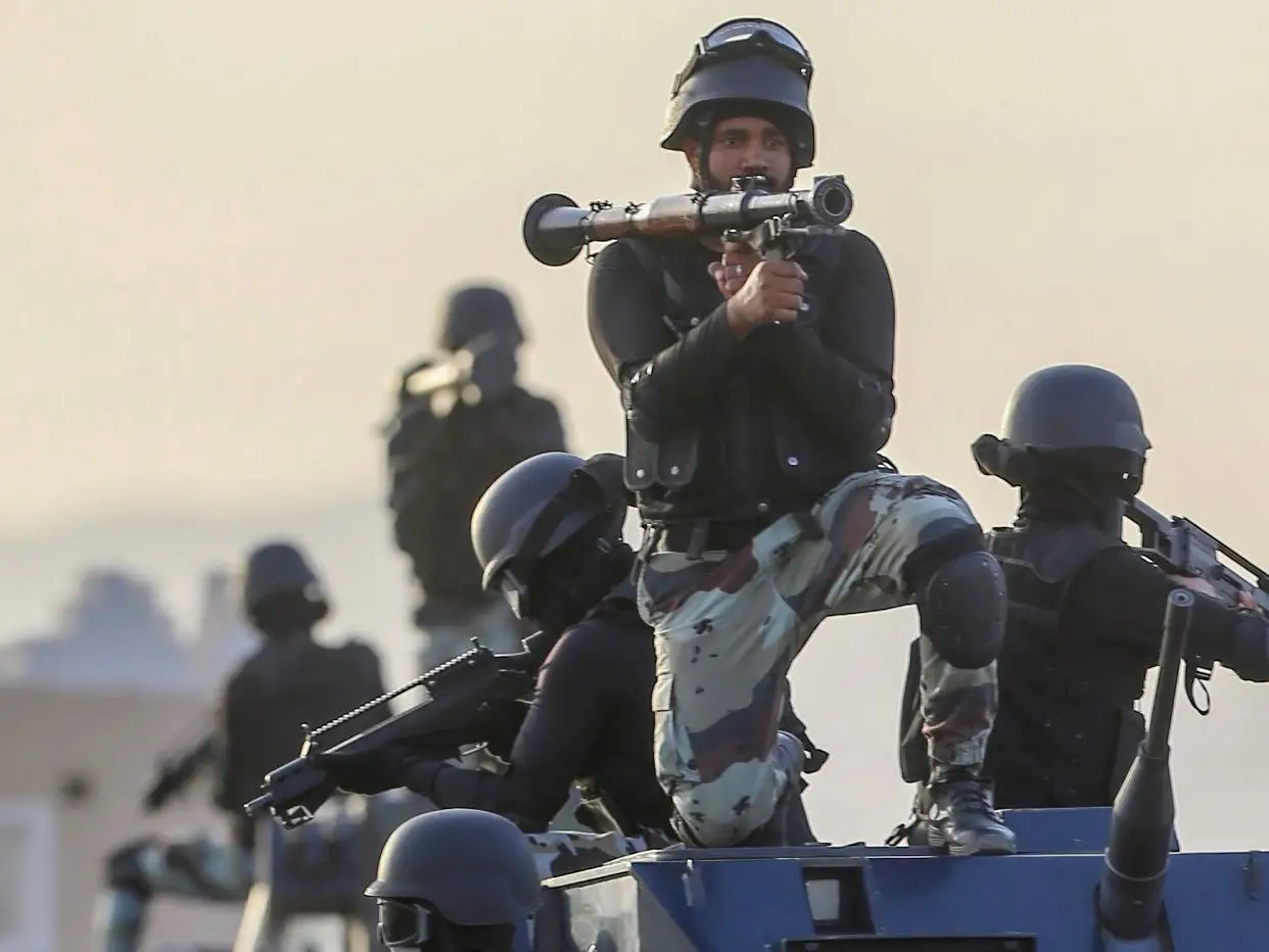 Saudi armed forces show their skills during a drill in Saudi Arabia's holy city of Mecca on August 13, 2018, ahead of the annual Hajj pilgrimage.
