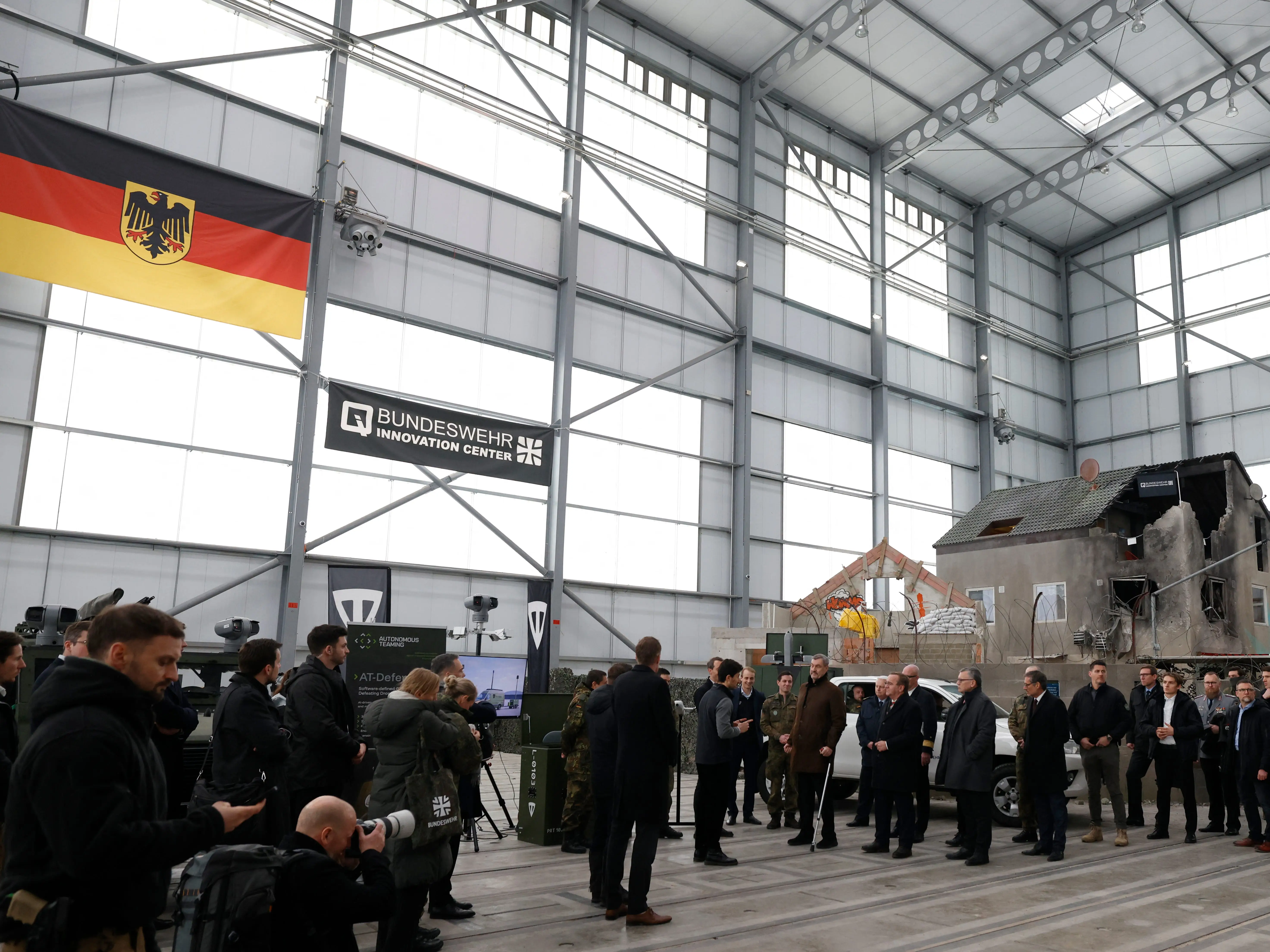 German Defence Minister Boris Pistorius and Bavarian State Premier Markus Soeder attend the inauguration of the Innovation Center of the German Armed Forces Bundeswehr in Erding, Bavaria, southern Germany on February 2, 2026.