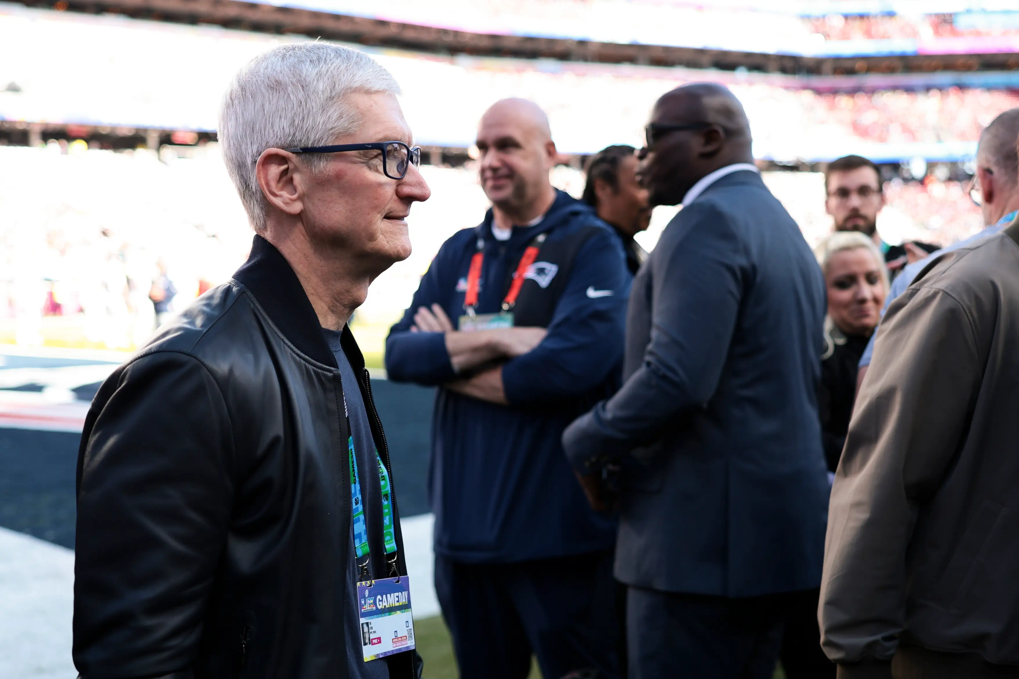CEO of Apple Tim Cook walks on the field prior to Super Bowl LX between the New England Patriots and the Seattle Seahawks at Levi's Stadium on February 08, 2026 in Santa Clara, California.