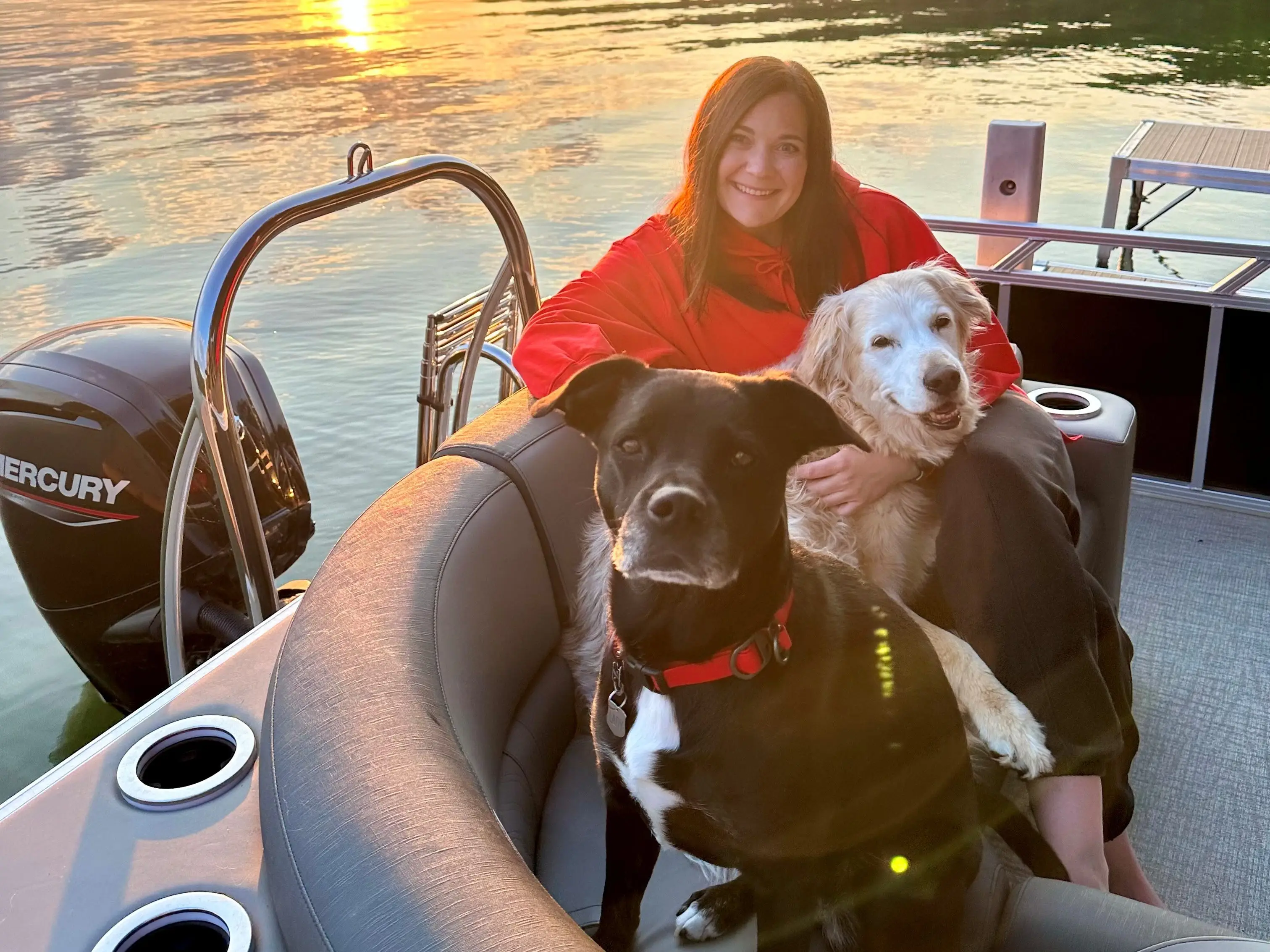 Kirsten Scheller with dogs on boat