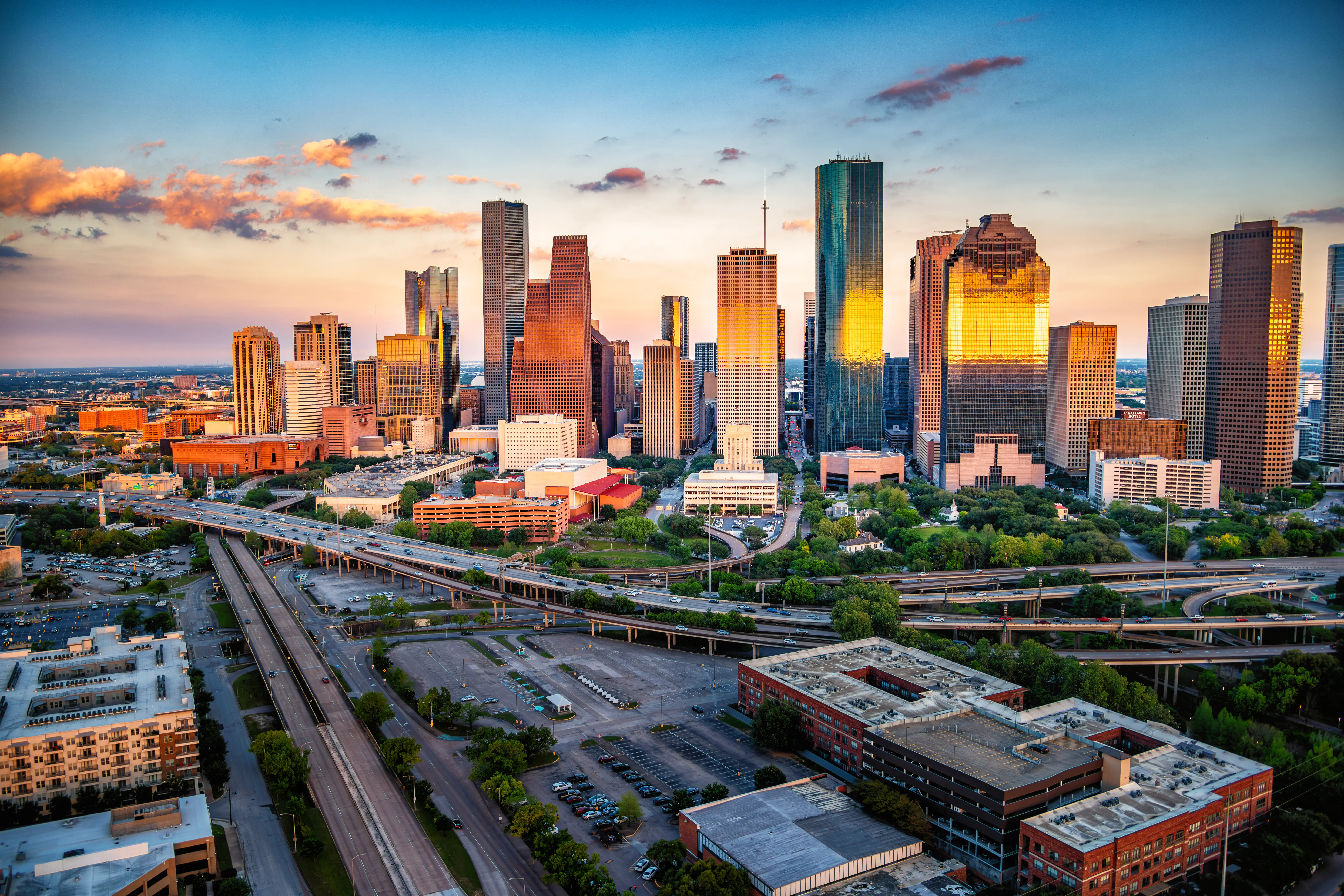 The skyline of Houston at dusk.