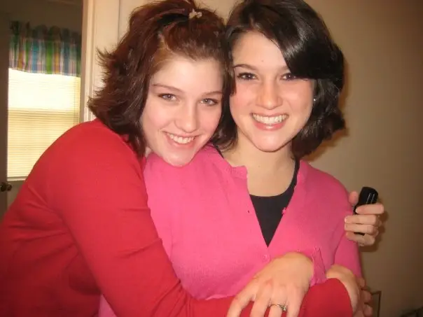 Sisters smiling for photo