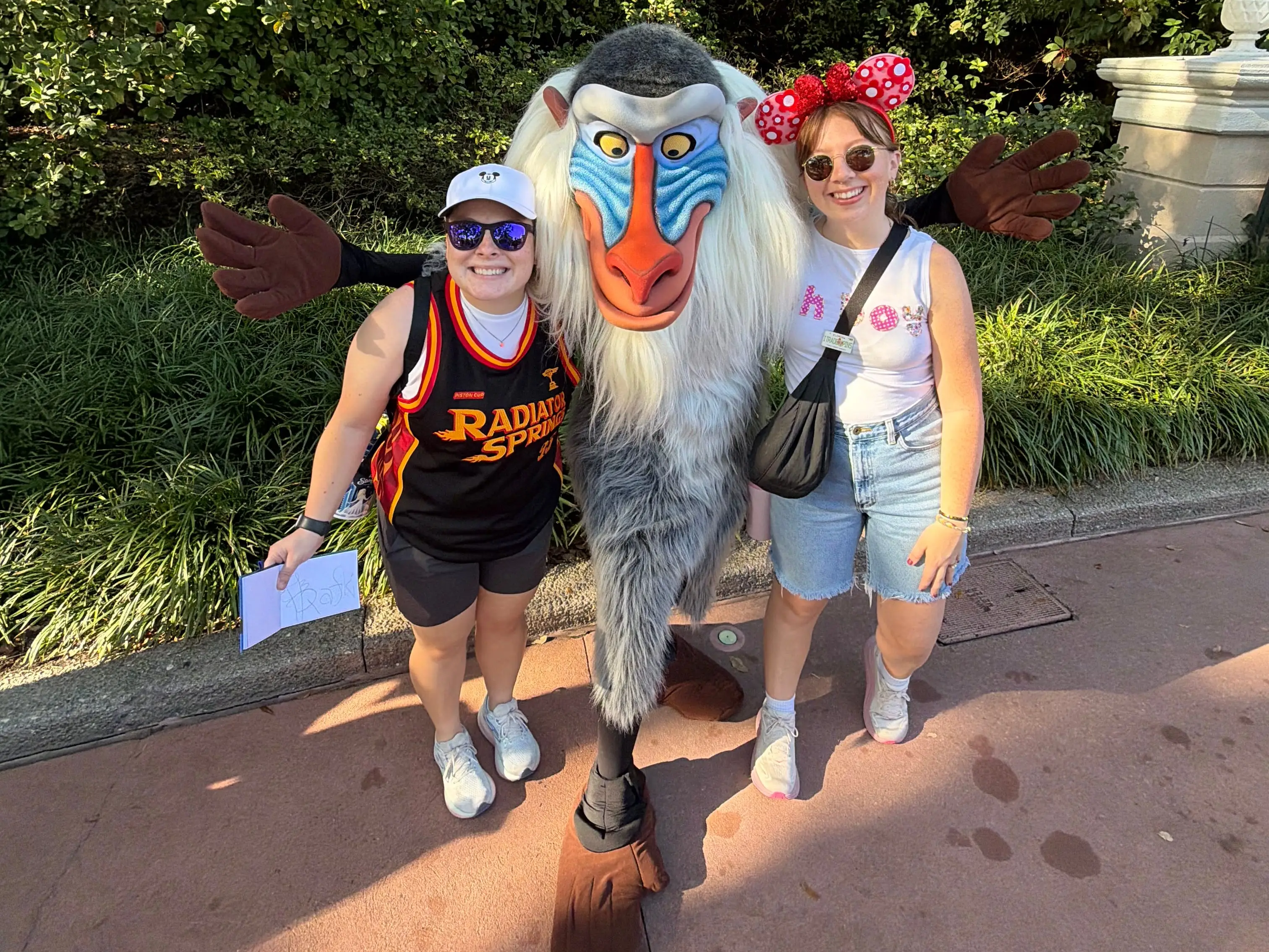 Author and their parter with Rafiki at Disney