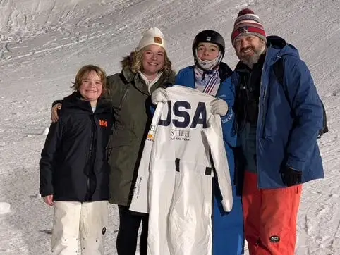 Family at base of mountain after training