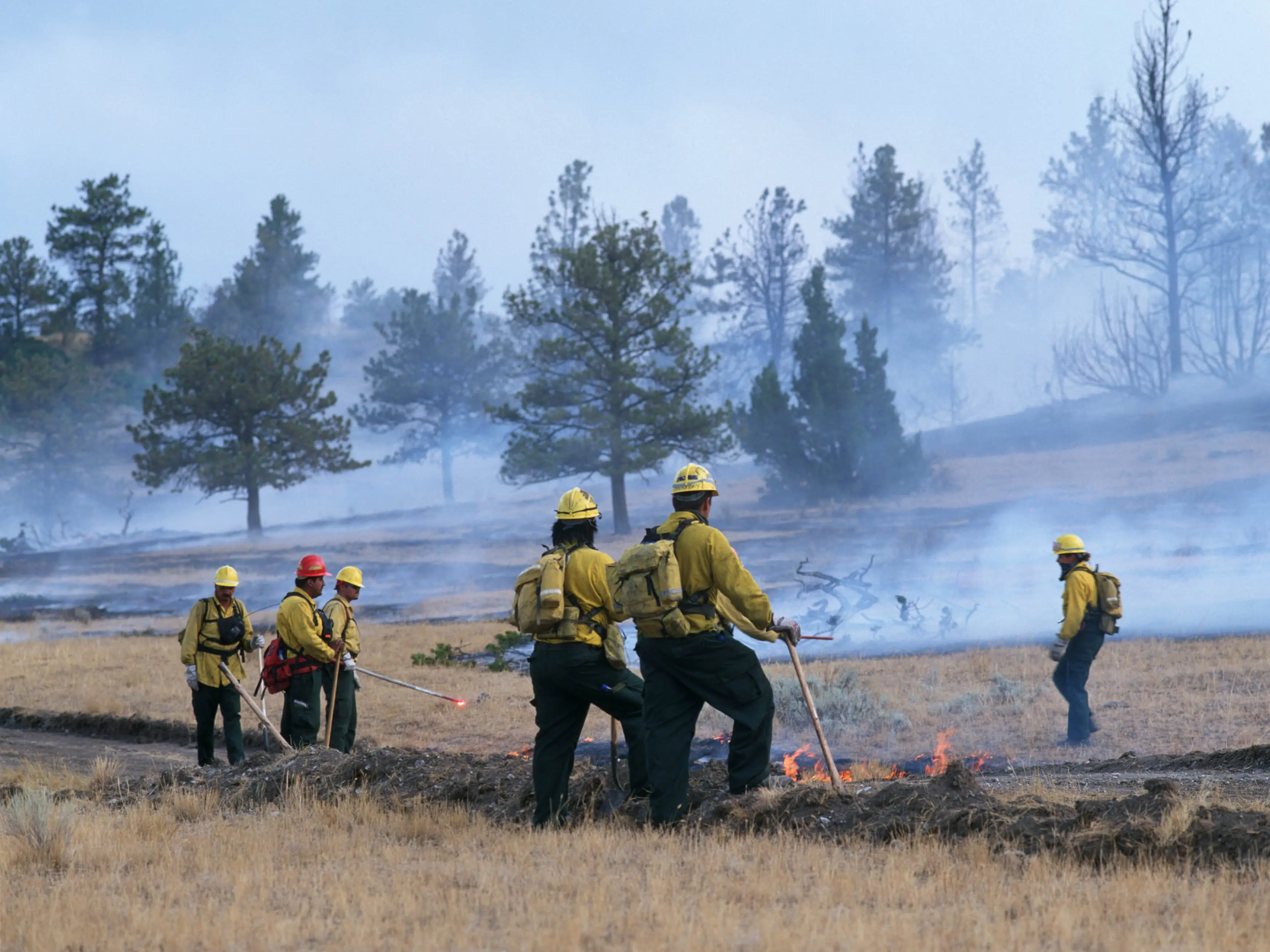 Firefighters put out a wildfire in Big Timber, Montana.
