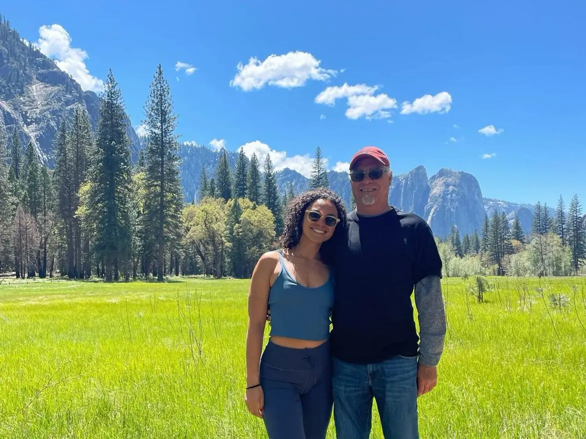 The author and her grandpa posing together.