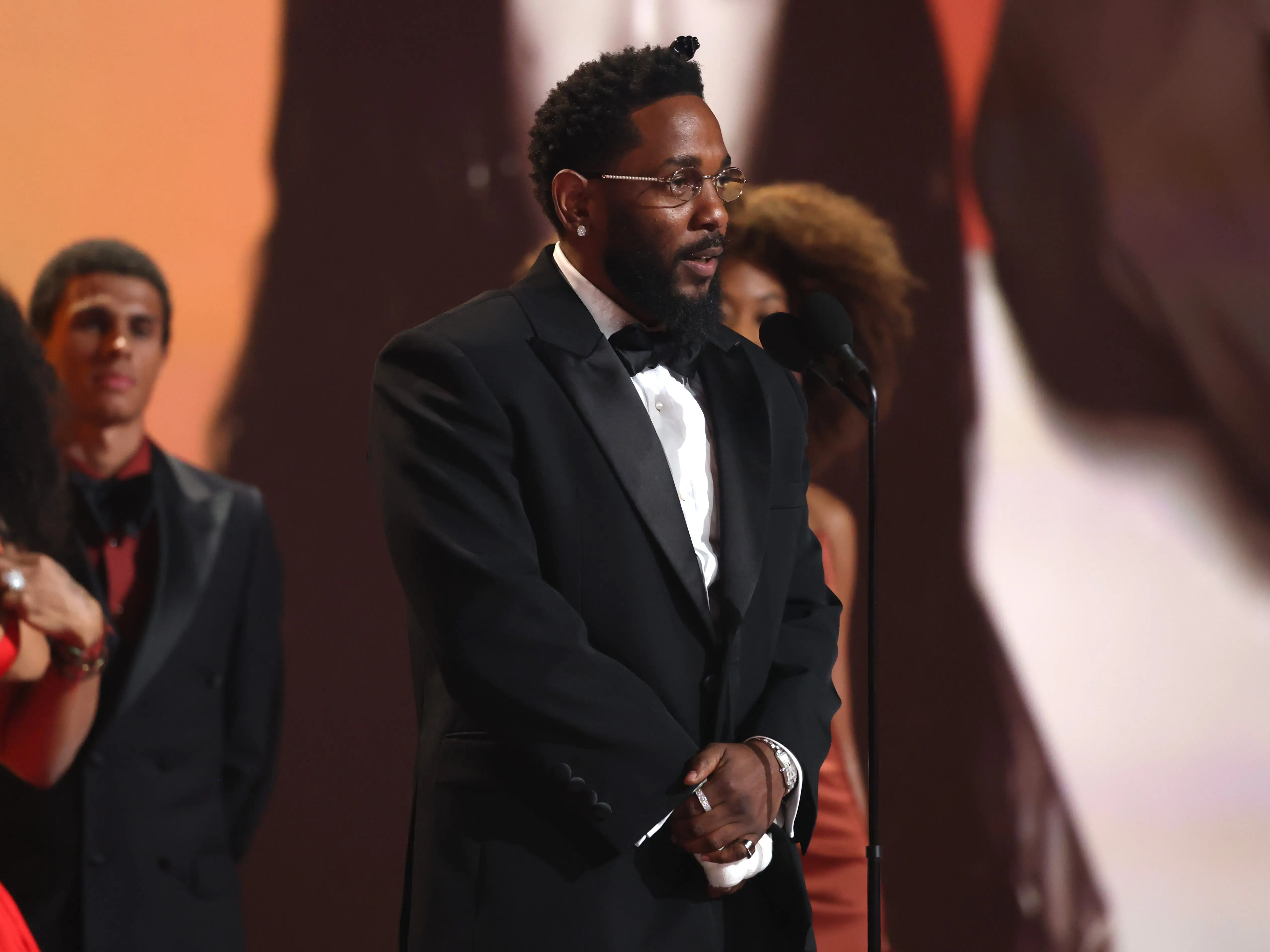 Kendrick Lamar accepts the Record of The Year award for 