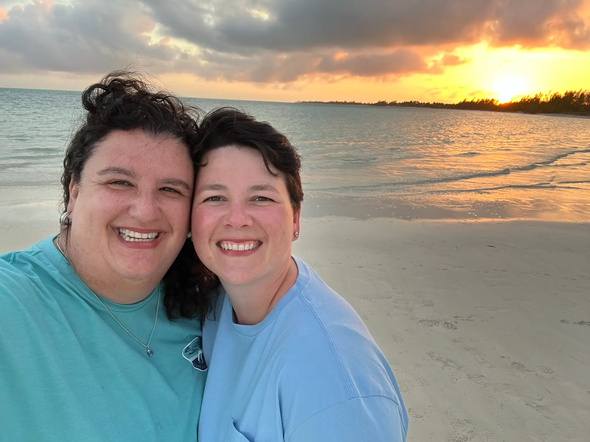 Author Tara Pyfrom and wife smiling