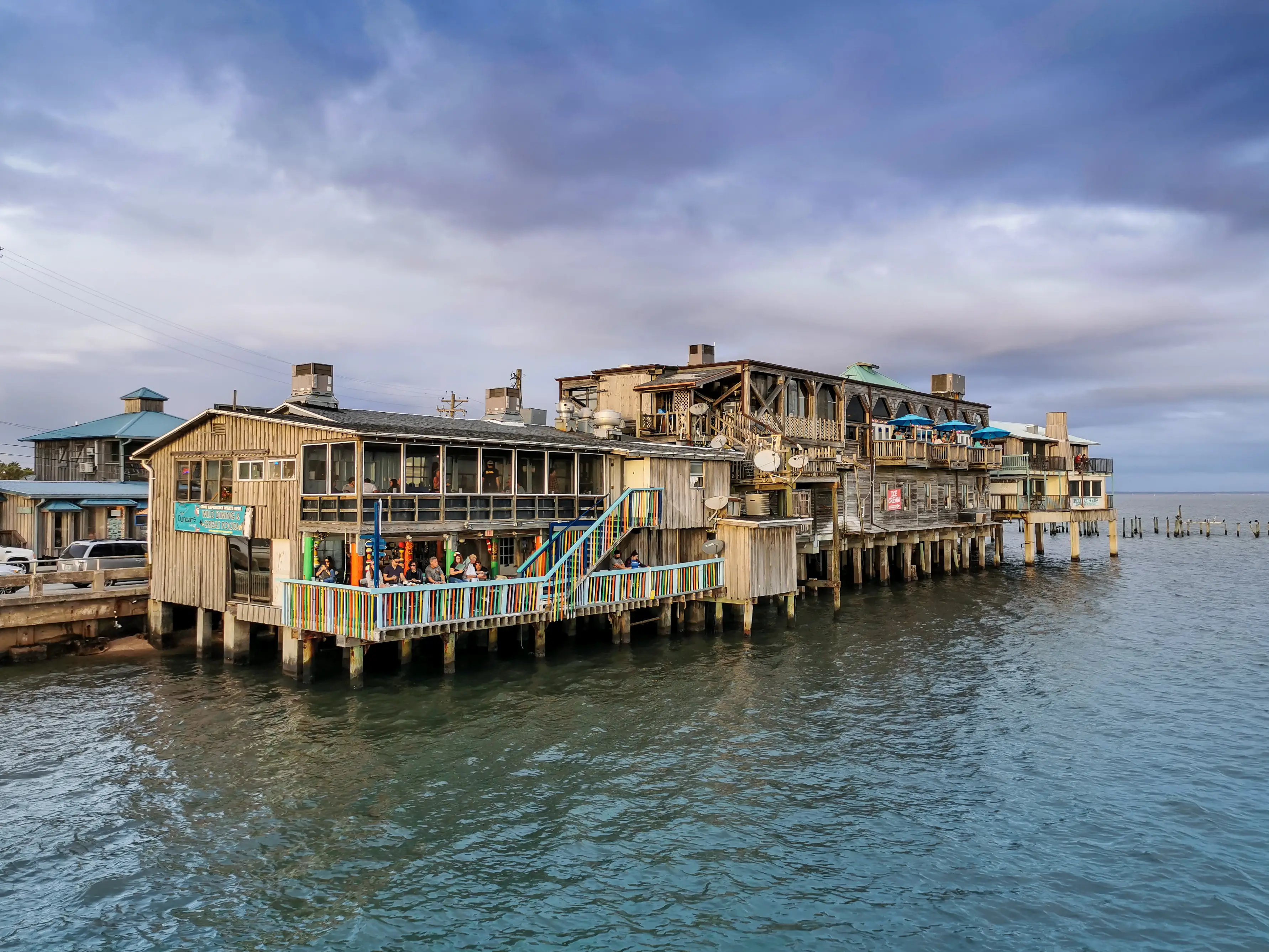 Cedar Key, Florida / United States, December 28th 2019: Waterfront buildings on stilts in Cedar Key tourist town, Gulf of Mexico
