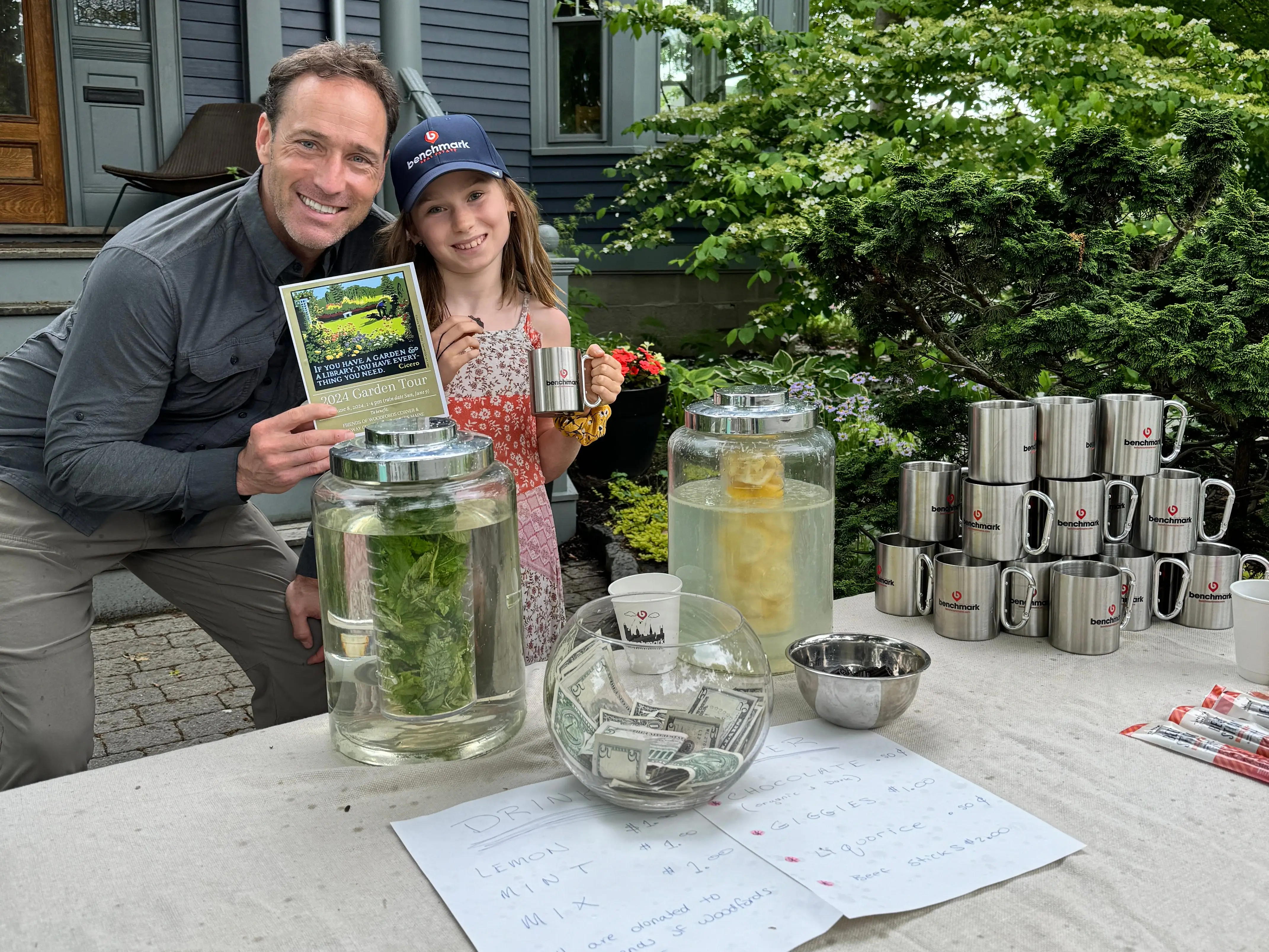 Girl and dad on lemonade stand