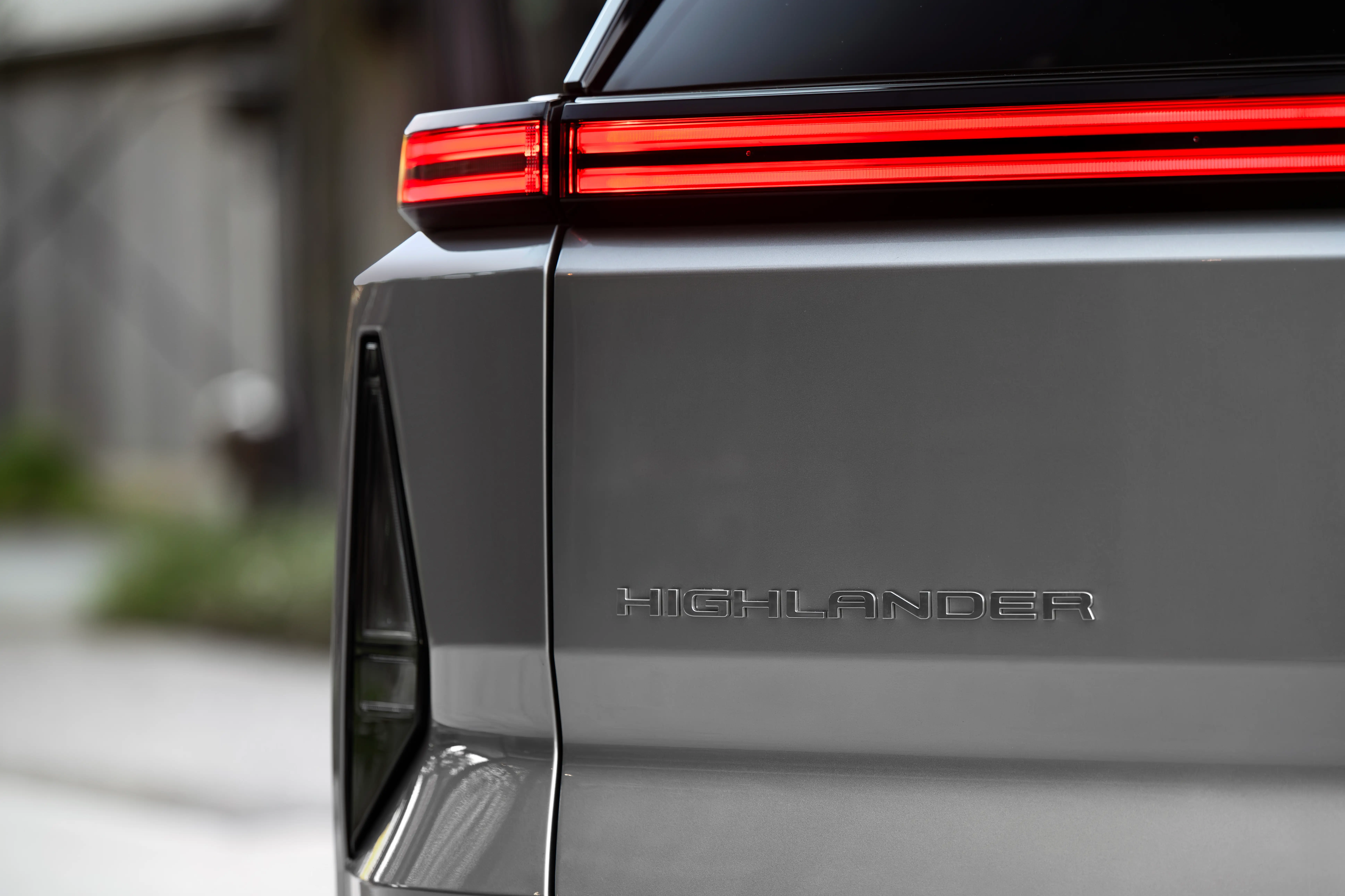 The Highlander badging on the back of the Highlander EV.