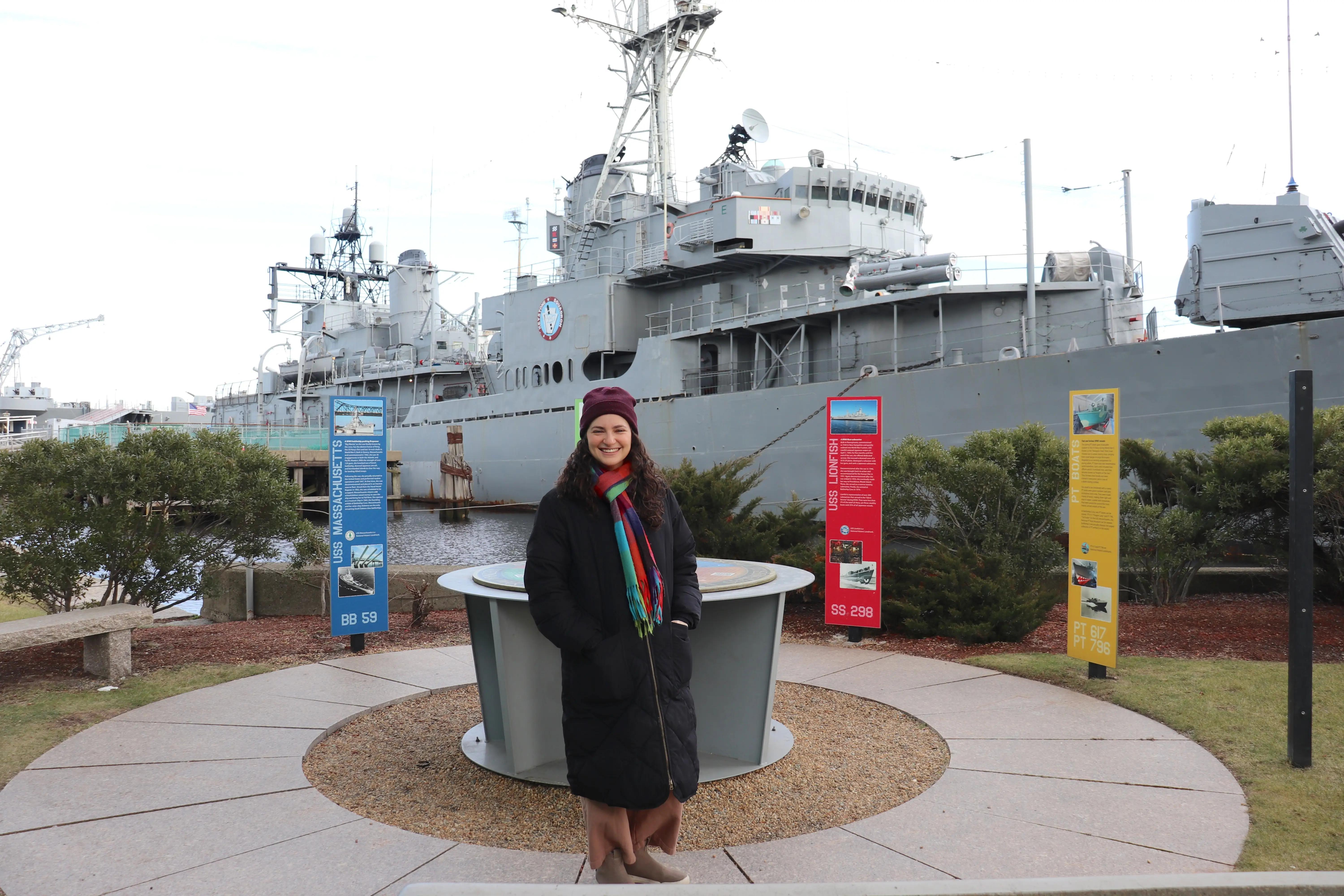 The author in front of the USS Joseph P. Kennedy at Battleship Cove.